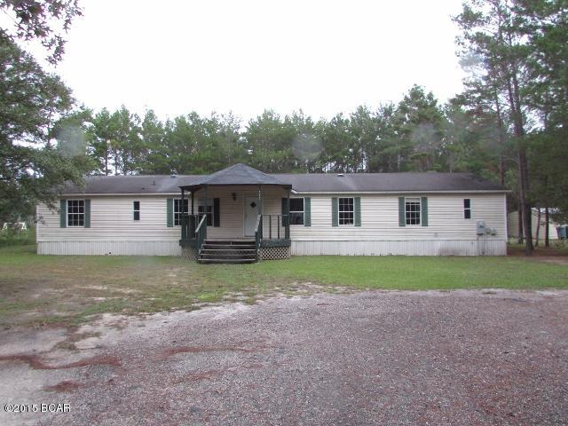 Large doublewide offers front and rear porches, huge living/dining area adjoining a large kitchen w/all appliances and breakfast area, a family room w/sliding glass doors opening to the rear porch, split-planned master suite w/walk-in closet, small bonus area, and full bathroom, and 3 more spacious bedrooms. Secluded location convenient to Ebro, Southport, Vicksburg, Youngstown, and Fountain. EQUAL HOUSING OPPORTUNITY!