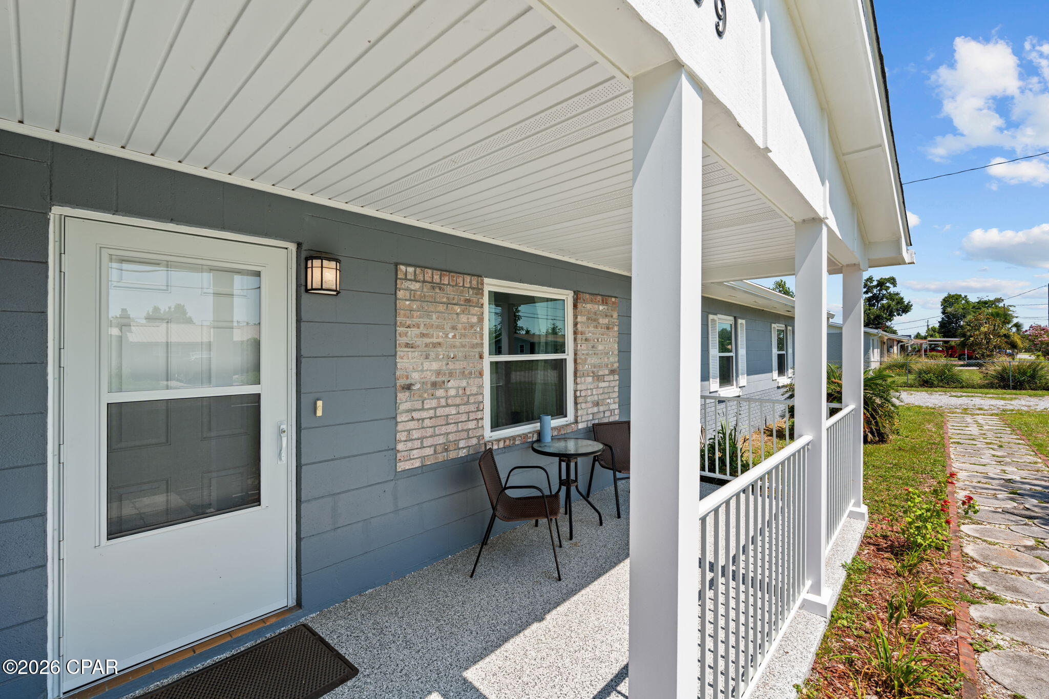 Don't let the 1965 build date fool you--this beautifully updated 4-bedroom, 2-bath home blends timeless character with modern peace of mind. Offering approximately 1,550 square feet of living space. This property is packed with value both inside and out.

Major improvements have already been completed, including a new roof on the home. The detached garage features its own electrical service, making it an ideal workshop, hobby space, or additional storage. A massive covered carport with concrete pad provides plenty of room for your boat, RV, or extra vehicles. 

Out front, the updated aluminum porch posts and railing create an inviting outdoor space to relax or entertain that is maintenance.

With no HOA, you'll enjoy the freedom to use your property without added fees or restrictive rules. 

Whether you're looking for your first home, a place to spread out, or extra space for your hobbies and toys, this property offers the flexibility today's buyers are searching for.

Conveniently located just minutes from Tyndall Air Force Base, shopping, dining, schools, and everyday conveniences, this move-in-ready home delivers comfort, functionality, and exceptional value in one complete package.