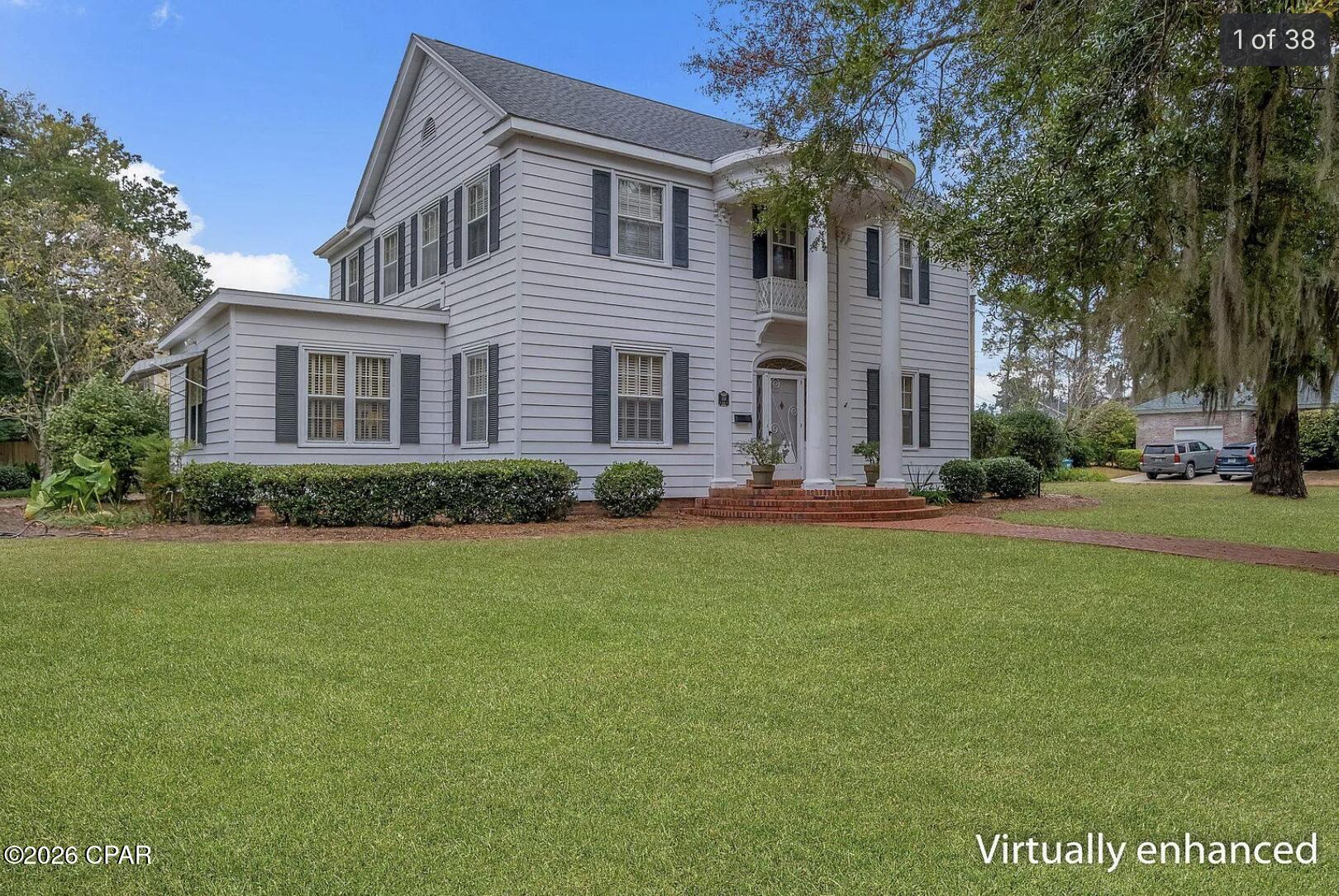 Timeless Colonial Revival in Historic Quincy! Built in 1938, this distinguished two-story home offers classic architecture and enduring elegance set amid a beautifully established landscape. With 4 spacious bedrooms and 4 Full bathrooms, the residence spans approximately 4,096 square feet and showcases beautiful hardwood floors. Gracious formal living and dining rooms provide the perfect setting for entertaining, while the large eat-in kitchen is ideal for everyday living. A bright and inviting sunroom adds extra living space and seamless connection to the outdoors. Rich in character and curb appeal, this exceptional property reflects the timeless beauty of one of Quincy's most cherished historic homes.