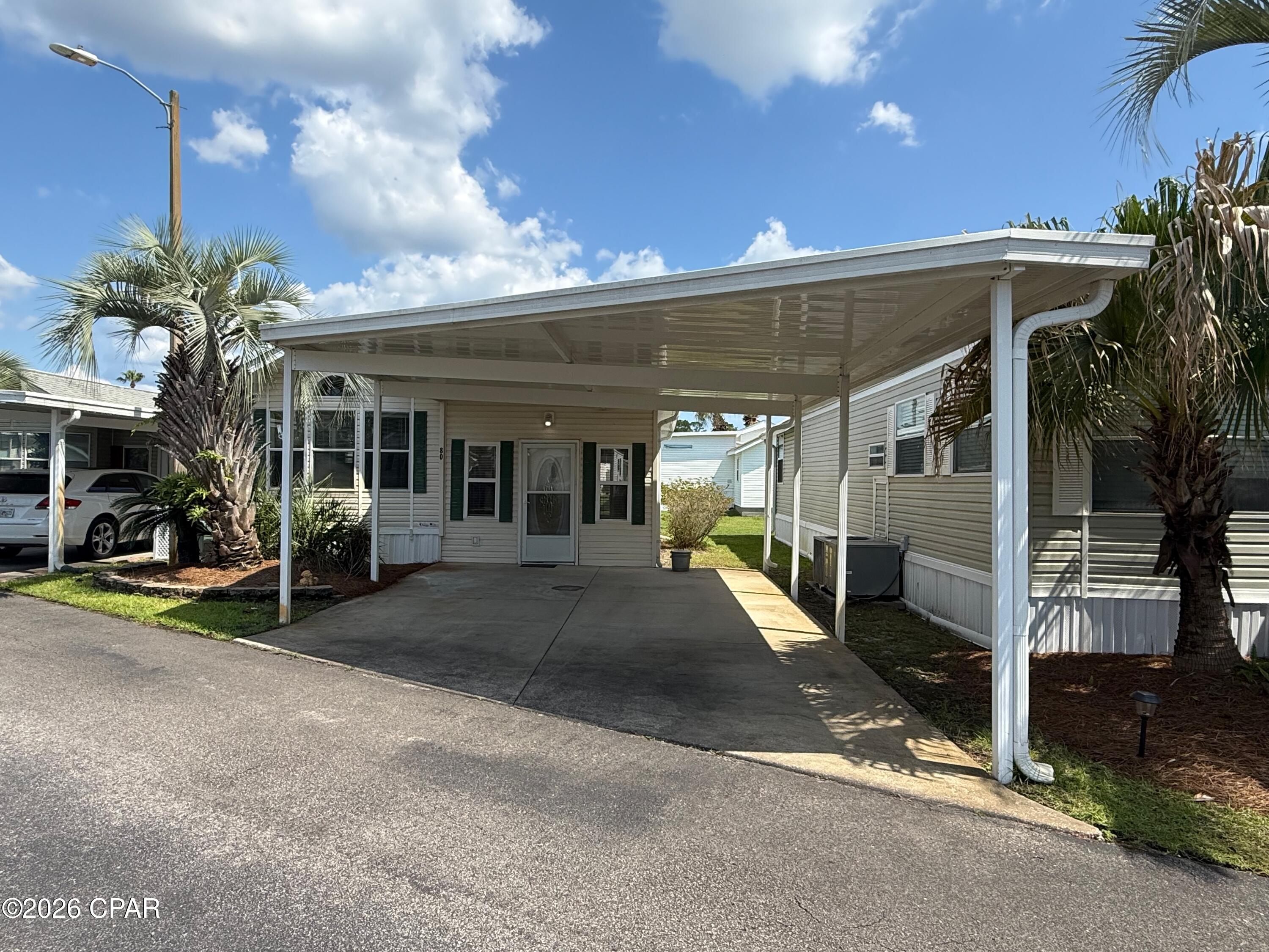 *Professional Pictures coming next week* Welcome home to this move-in-ready 1-bedroom, 2-bath, 756 sq. ft. residence in Emerald Pointe Resort--an ideal beach retreat in one of Panama City Beach's most desirable communities. The home offers a spacious living room, comfortable dining area, large primary bedroom, ensuite bath with walk-in shower, and a screened-in patio with added storage. The laundry room accommodates a full-size washer and dryer, and the lot provides extra space for future expansion. Recent updates include fresh interior paint, new carpet, a 2023 roof, and a 2017 HVAC system.
Emerald Pointe Resort is a gated community on the quiet East end of Panama City Beach, near popular restaurants, shopping, and beaches known for their sugar-white sand and emerald-green waters. Amenities feature a spacious clubhouse, fitness center, shared library, two pools (one heated seasonally), hot tub, lake with boardwalk, and shuffleboard court. The HOA fee covers water, sewer, garbage, Wi-Fi, and lawn care. Don't let this incredible property slip through your fingers! Schedule a tour today and see for yourself what this amazing property has to offer. Please note: All information is approximate and should be verified by the buyer if important.