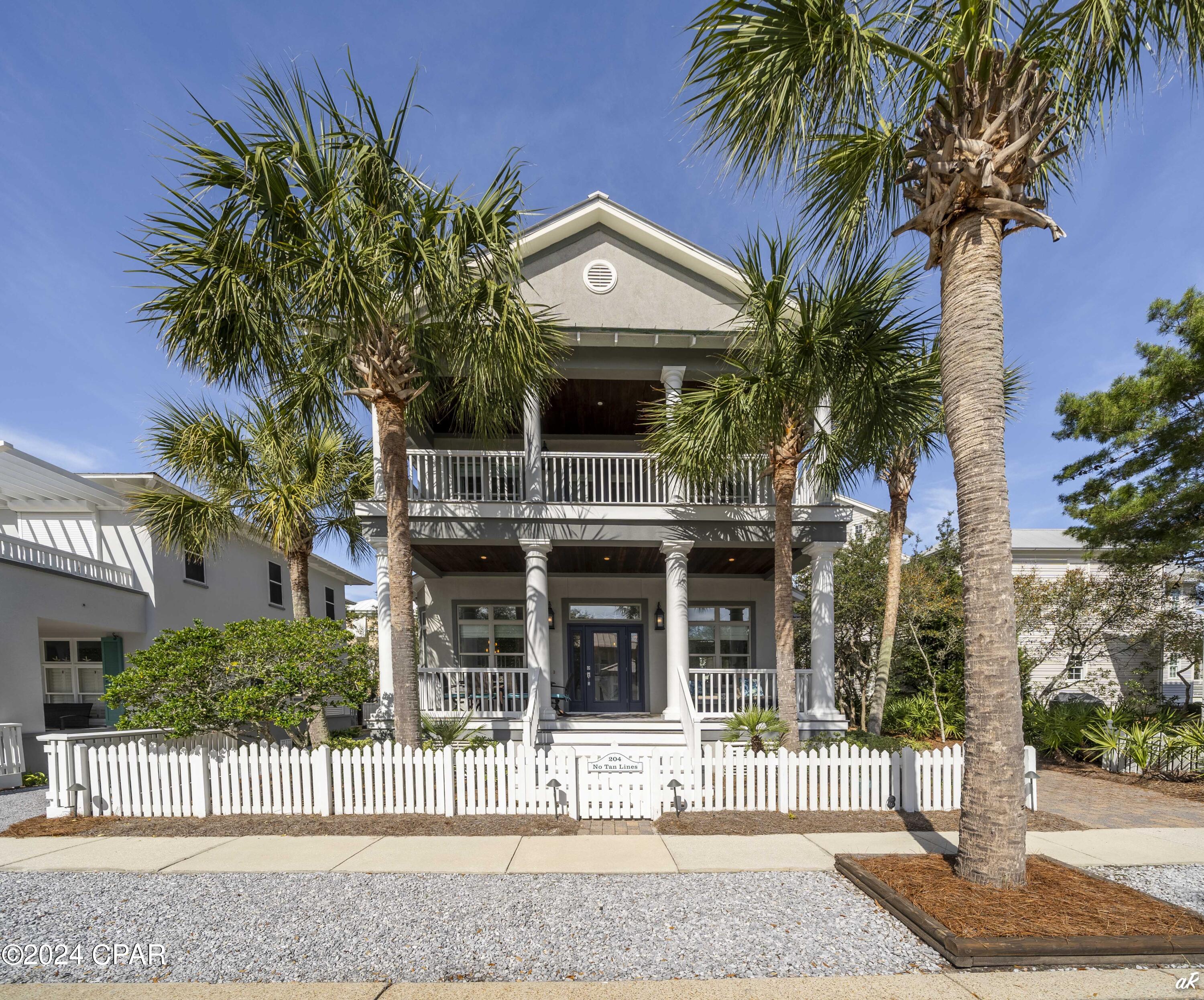 ''No Tan Lines'' is located on the quiet and serene Dunecrest Lane. This house is tucked into lovely native pine and oak trees. It is three stories, three bedrooms, built-in bunk beds off the second floor hallway and tower (3rd floor) with great views of the Gulf of Mexico. One of the bedrooms is so large that it has ample space for two queen beds. The double loaded front porches are spacious and shady - perfect for visiting, reading, or just enjoying being at the beach. The handy side porch and door, off the driveway, lead directly into the kitchen for ease in unloading groceries and luggage. According to the Design Review Board, the lot is large enough to build a guest house or a pool. All plans need approved by the DRB.  The Dunecrest walkover is seconds away from this nicely appointed home. Nicely maintained and furnished, this property is ready for your beach home or as a rental property - move-in ready.