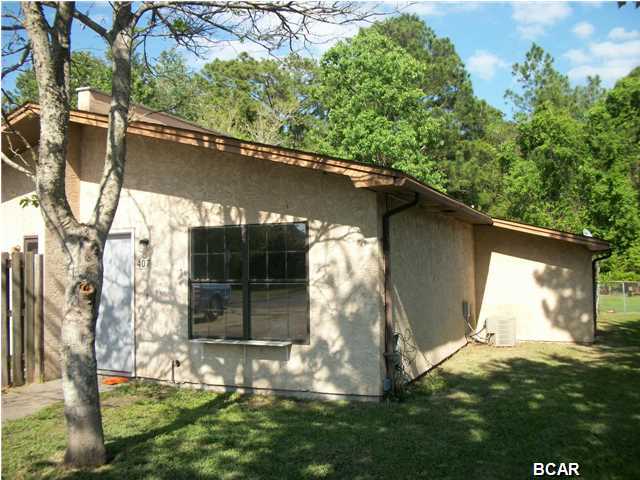 Quaint 1 bdrm/1 bath duplex with vaulted living room & kitchen ceiling, and tile floors everywhere except bedroom. Washer/dryer hook up with shelving storage; tenant pays all utilities. NO PETS - NOT negotiable. Quiet neighborhood; close to Tyndall Air Force Base, shopping, and less than 4/10 mile from Patterson Park with boat ramp, baseball diamondS, and tennis courts! One (1) year lease required. $30 application fee.