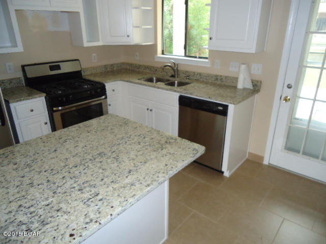 Age, SF, and dimensions approximate. Beautifully renovated unit on the canal. All new kitchen appliances and cabinets. Granite counter tops. New roof. New tile downstairs and laminate flooring upstairs. A must see!!