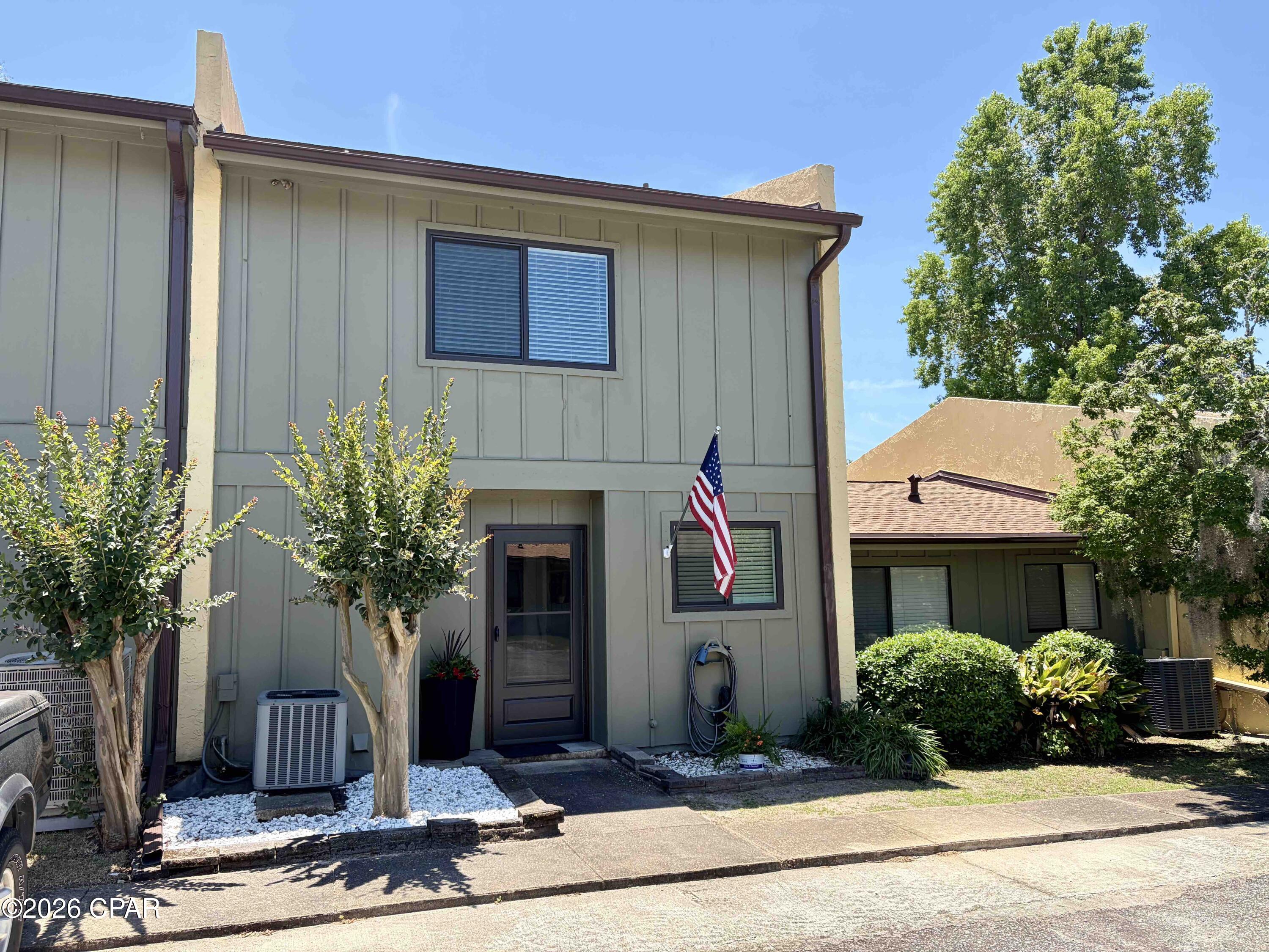 Assumable 3.375% Mortgage Opportunity!!!  This beautifully updated 2-bedroom townhome is move-in ready and packed with recent upgrades.  The home features all new windows, a new front door and storm door, new bathroom vanities with stone countertops, new faucets and mirrors, a deep soaking shower/tub combo with sleek marbled acrylic wall panels, plus... the master has a double sink vanity.  You'll also find new lighting fixtures, a new hot water heater, and fresh neutral paint throughout.  The kitchen is equipped with new stainless steel appliances and an upgraded deep single-bowl stainless steel sink with new faucet.  Laundry room includes a newer washer and dryer.  Following Hurricane Michael, the unit received major upgrades including a new roof, new sliding glass door, new laminate flooring, and a major overhaul on the A/C system which has been maintained with a bi-annual service plan.  Outside, two productive peach trees grace the backyard of this quiet, tucked-away unit located in the heart of Panama City.  The centrally located complex offers easy access to Gulf Coast College, the historic St. Andrews district, excellent restaurants, shopping, schools and more.  Residents enjoy a community pool with clubhouse, tennis court, and plenty of green space perfect for walking pets or playing with kids.  This is a rare opportunity in a prime location--don't wait, it won't last long!  HOA is only $172.50 per month!
