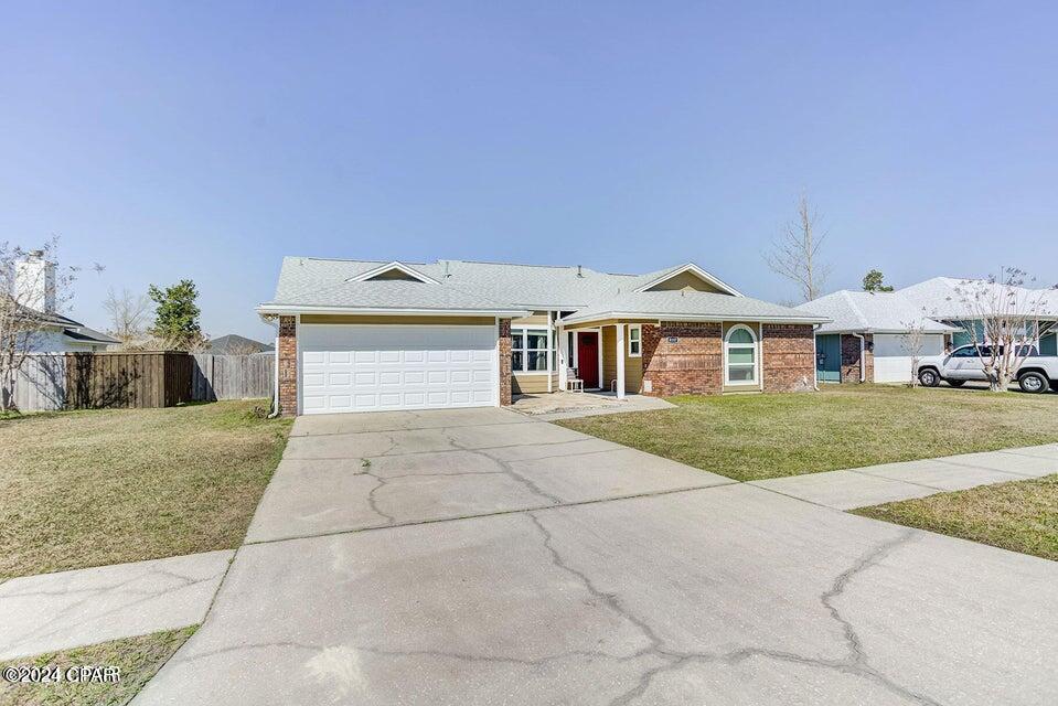 Check out this beautiful home in Callaway, just minutes from TAFB, Offering FREE MONTH of RENT!!. This home has an impressive floor plan with a formal living or dining area just inside of the front door, luxury vinyl plank throughout, and a gourmet kitchen with a gas stove overlooking the HUGE fenced backyard. Pets are negotiable. The den area has a cozy brick fireplace and 10ft ceilings. Bedrooms are ample in size with a split floor plan. You will LOVE the huge laundry room and the backyard has a nice shed to store your things! Want to see this beauty? Text a photo of your driver's license to the OFFICE phone number, along with the address of this home and we will get your showing set up within 1 day!