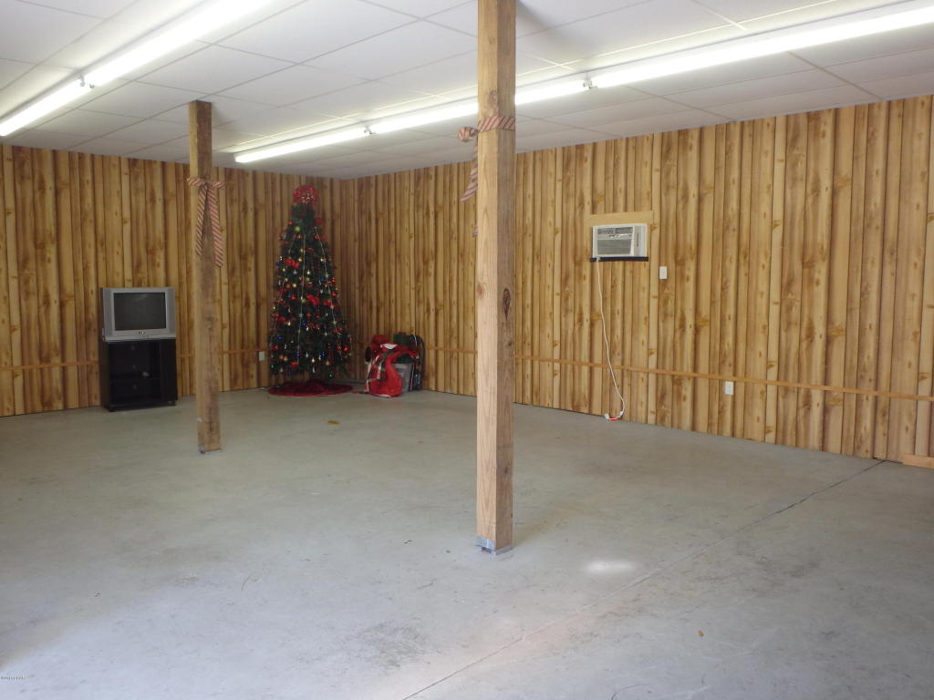 WAREHOUSE space ready to rent! 10,000 SF includes two restrooms and 700 SF office area. Ceiling skylights let in natural light to minimize daytime electric needs in the warehouse. The loading dock will be shared with the adjacent Salvation Army managment office and BACK WAREHOUSE TENANT. This is a Modified Gross Lease, tenant responsible for monthly rent, sales tax, and utilities. Convenient location, at Lisenby between 15th and 23rd streets in Panama City. This area allows for an easy in and out for delivery vehicles. The Front Warehouse includes 700 sq ft of office space, two restrooms and a total 9200 SF warehouse space and supports fire suppression systems.  LEASE PRICE IS MONTHLY PAYMENT, based on $6 per SF Annual Lease The Warehouse is equipped with extremely large fans (see pictures), offering plenty of ventilation for stored items and warehouse workers, and includes a tractor/trailer height dock in front with 14 foot Roll up door as well as an additional bay along the side loading dock.  Electrical 220/Phase III line is available.