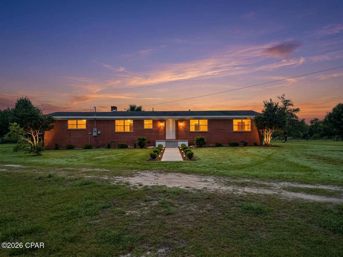 Escape to the peace and privacy of country living with this charming 3-bedroom, 2-bath brick home situated on 2.65 fully fenced acres at the end of a dead-end road. This established hobby farm is ready for your animals and outdoor lifestyle, featuring a large barn equipped with electricity and animal stalls, a chicken coop, multiple fenced pens, and additional shelters throughout the pasture.

The property offers plenty of space for livestock, gardening, and recreation while providing the security and convenience of a fully fenced perimeter. Enjoy the tranquility of rural living without sacrificing accessibility--located just 8 minutes from downtown Marianna, you'll have quick access to shopping, dining, schools, and everyday amenities.

Whether you're looking to start your homesteading journey, expand your hobby farm, or simply enjoy the privacy and freedom of country life, this unique property offers endless possibilities.