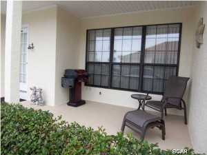 Short walk to the beach ! FIRST FLOOR condo with large front porch & covered porch in back that overlooks the pool. Great spacious open kitchen with lots of counter space & breakfast bar. Hallway bunks. Parking right outside your front door. This building is very close to Front Beach Rd with beach access. Includes all furnishings. Affordable resort community with four pools, the large main pool is heated, kiddie pool, plus whirlpool, mini golf, tennis courts, shuffleboard, basketball, game room, clubhouse w/kitchen, golf cart friendly gated community, situated on 22+ acres. Horizon South is located directly across the street from the beach with access. Near Pier Park shopping & restaurants and Gulf World. Great primary home, vacation home, or investment property.