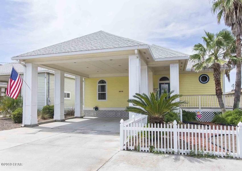 Come see this Beautiful Gulf Front House ''Shimmering Sands''.  This home sits directly on the beach overlooking the Gulf of Mexico. It is on the East end of the Beach, just a short walk to Panama City Beach's local beach club  ''Schooners. 4 bedroom, 4 bath with open floor plan. 3 sets of French doors that open onto the huge deck, where the view is breath taking. Home is being sold completely furnished, all you have to bring is your clothes. New roof in January 2019. The house is on a vacation rental program.

Contact agent to see this property before it is gone.