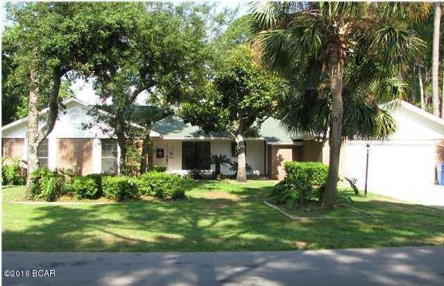 This ranch style home has a nice brick front porch, a large master bedroom, a large master bath, a walk-in closet, and a large living room with a vaulted ceiling and skylights. This home also features split bedrooms, a brick gas fireplace, a separate formal dining room, a laundry room, a large eat-in kitchen, and a beautiful covered and screened back porch overlooking the large back yard. The back yard also has young citrus and fruit trees soon to fruit. The apartment features a full kitchen, 1 bedroom, 1 bath, a walk-in closet, and a private enclosed sunroom overlooking the same back yard. A 6 foot privacy fence borders the entire back yard. All Sizes are approximate please measure if important.