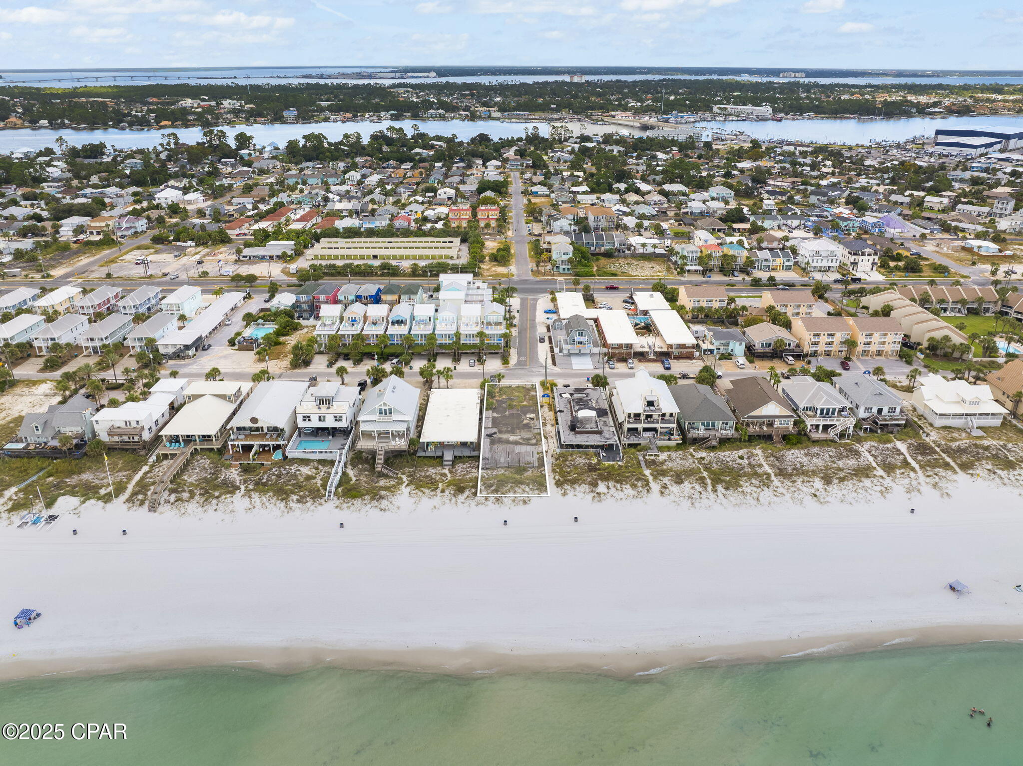 A rare chance to own prime Gulf-front property in one of the most desirable stretches of Panama City Beach. This cleared 0.29-acre parcel sits directly beside from public beach access #7, offering unmatched visibility, walkability, and development potential.

Zoned mixed-use, the property allows for a wide range of possibilities. With no HOA restrictions, public utilities near by, and paved road access, it's a straightforward site to bring your vision to life.

Whether you're a developer, investor, or visionary builder and want to bring your dream home to life, 5403 Gulf Drive is your chance to create something extraordinary on Florida's Emerald Coast.