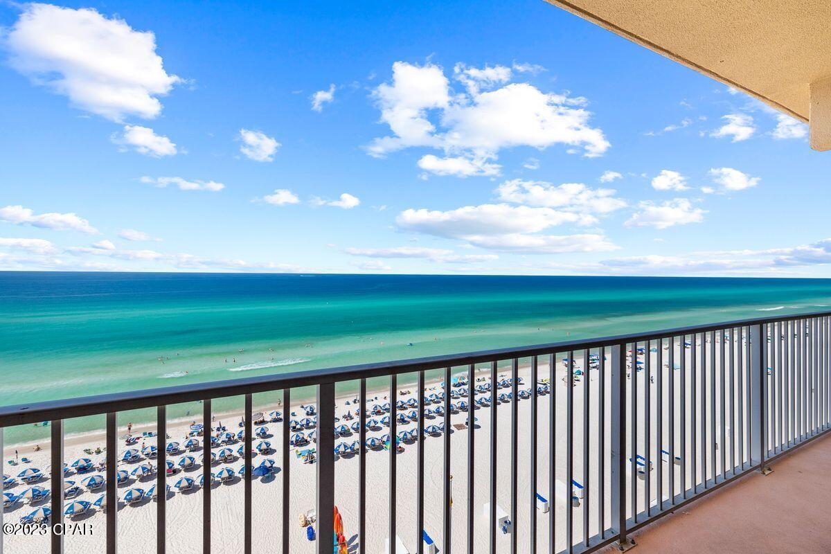 Breathtaking views and sunsets of the Gulf of Mexico await from the private balcony of this 7th floor unit at the Tidewater Beach Resort. This unit is 923 sq ft and includes a primary suite, bunk area, 2 full baths and living/dinning room with views of the emerald green waters and the beautiful white sands of Panama City Beach. This unit boasts a large balcony with sliders from the living room and the primary suite, whirlpool appliances, 9 ft ceilings, granite countertops and sleeping for 6. Tidewater has exceptional amenities including beach service, arcade, parking garage, 24 hr security, 2 outdoor pools and hot tubs, indoor pool, 2 indoor Roman Spas, fitness center, steam rooms, sauna, onsite restaurant, Starbucks, Flip Flops Grills, Tiki bar and owners RFID bands for security. Fully furnished and turn-key ready. Tidewater is located less than a mile to Pier Park and 30 minutes to N.W. Beaches International Airport making it a great condominium for rental income generation.