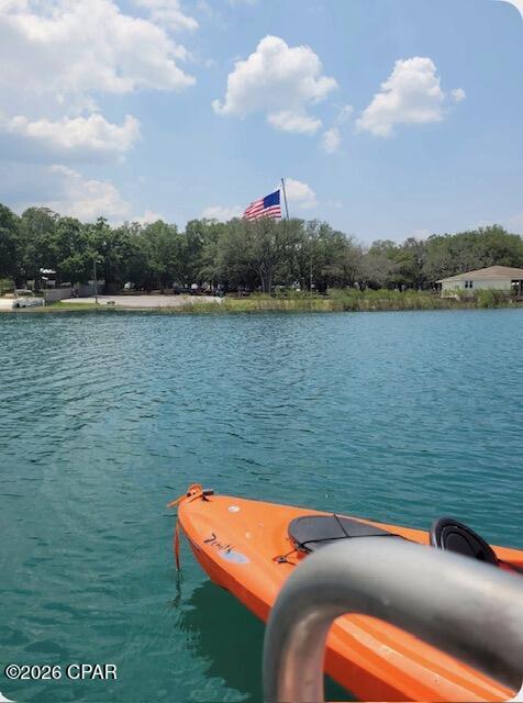 Escape to the serene beauty of Leisure Lakes, a spring fed lake, where this spacious homesite offers the opportunity to create the lifestyle you've been dreaming of. Surrounded by nature and located within a gated lake community, this property provides the perfect backdrop for a custom home, vacation home or mobile home. Residents enjoy access to spring-fed lakes, boat ramps, a community pool, tennis and basketball courts, playgrounds, and picnic areas. Spend your days fishing, boating, kayaking, or simply soaking in the peaceful surroundings. With Panama City and Panama City Beach just a short drive away, this property combines the best of country living and coastal convenience. Build your future in Leisure Lakes and start enjoying all that this exceptional community has to offer.