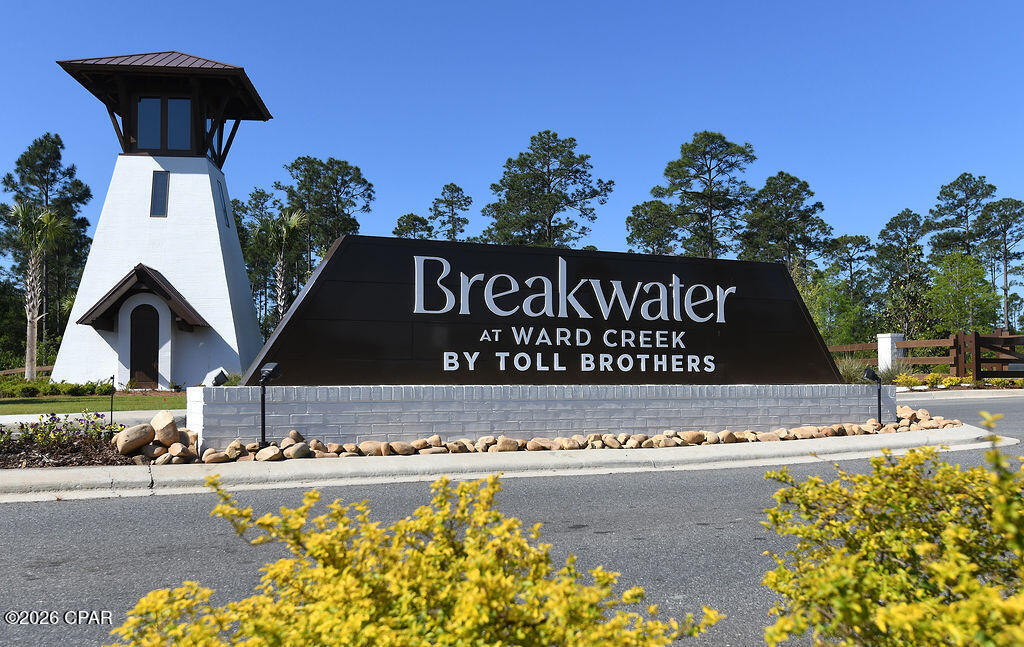Welcome to the new exclusive gated community of Breakwater featuring Toll Brothers homes. This new three bedroom two bath home is offered completely furnished with  all of the luxury that this builder provides. This home provides style and comfort with a spacious great room and open kitchen featuring elegant quartz countertops and a large island. The primary bathroom is a spa like experience with dual vanity, large tile shower, spacious soaking tub and walk-in closet. The entire home boasts 10' ceilings, creating an airy and open feel throughout. You will have access to resort-style amenities, including a pool, clubhouse, fitness center, pickleball courts, tennis court, playground, and a multi-purpose field for your active lifestyle. Located just minutes to beautiful public beach access, Northwest Florida Beaches airport, future medical campus, and future West Bay Center with Publix. Shopping, dining, and various entertainment centers are also minutes away. 
One year lease is required. Tenant is responsible for electricity, internet and renters insurance. All other utilities and garbage is provided by owner. This home is available October 1, 2026.