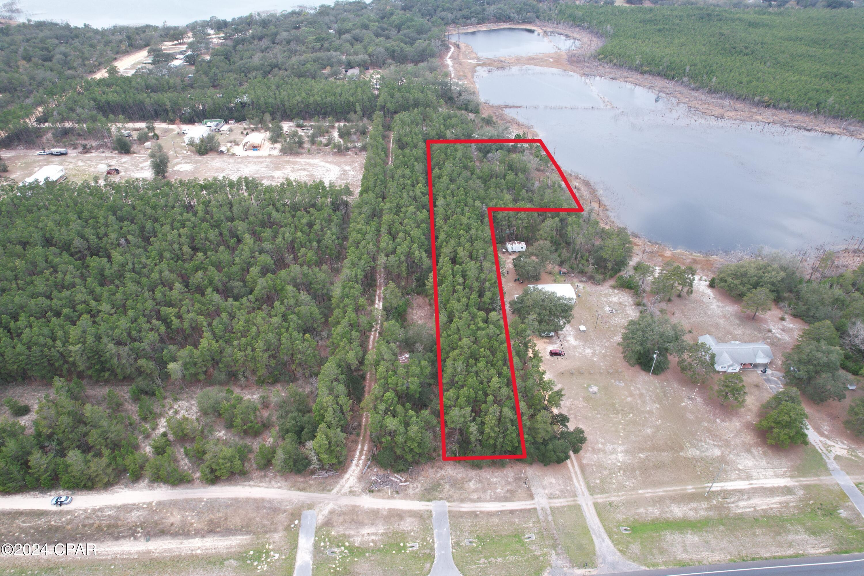 Nestled on the edge of a picturesque small lake, this 2-acre parcel offers an enchanting escape from the hustle and bustle of everyday life.