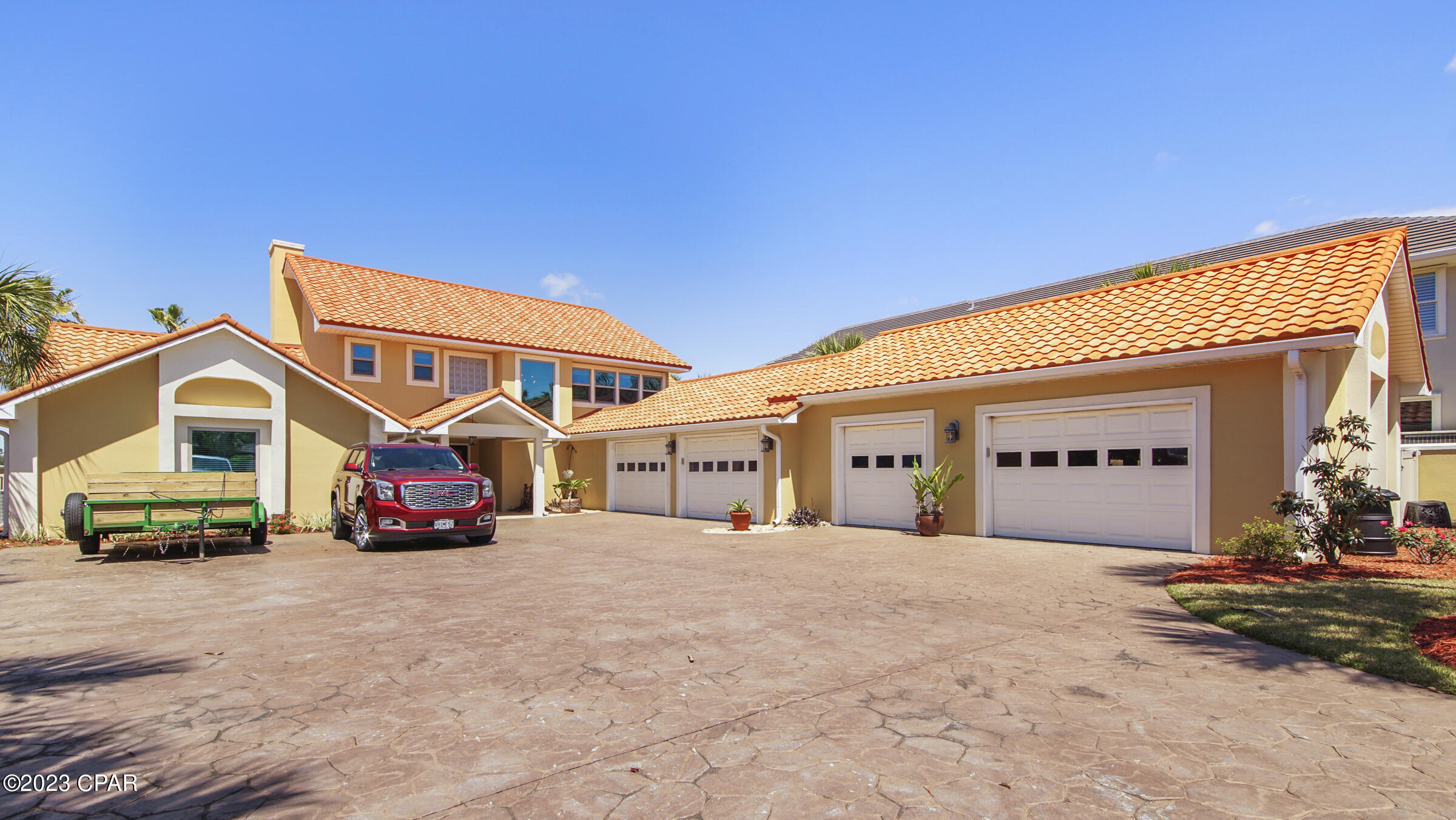 Waterfront beauty with deep water access in Bay Point! One of the few homes on the market with the ability to dock large boats/yachts and be at Shell Island or the Gulf of Mexico in a few short minutes. Enjoy breathtaking open water views with a beautiful back yard filled with palm trees and a swimming pool. The updated interior includes custom cabinetry, granite, stainless appliances, a double sided fireplace, a spacious open living room, a sauna and more. The master bedroom is upstairs with waterfront views and a large updated master bathroom. Bay Point is a gated community located on Grand Lagoon with security, golf courses, tennis, full service marina, restaurants, on site post office, and more. Call today for your private showing.