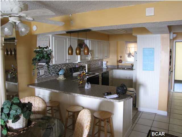 Updated Gulf Front 1 Bedroom, 2 Full Bath unit at Regency Towers, a popular Panama City Beach, Gulf-Front Condominium Resort on Thomas Drive, The Regency Towers Resort is a gated property with 24-hour security, 2 large swimming pools (one heated), a children's pool, a gorgeous hot tub, beach side boardwalk and sun deck, 2 lighted tennis courts, an area to play basketball, shuffleboard courts, and exercise facilities.  UNIT IS UNAVAILABLE FOR SHOWING JULY 23RD THRU JULY 31ST, 2015.