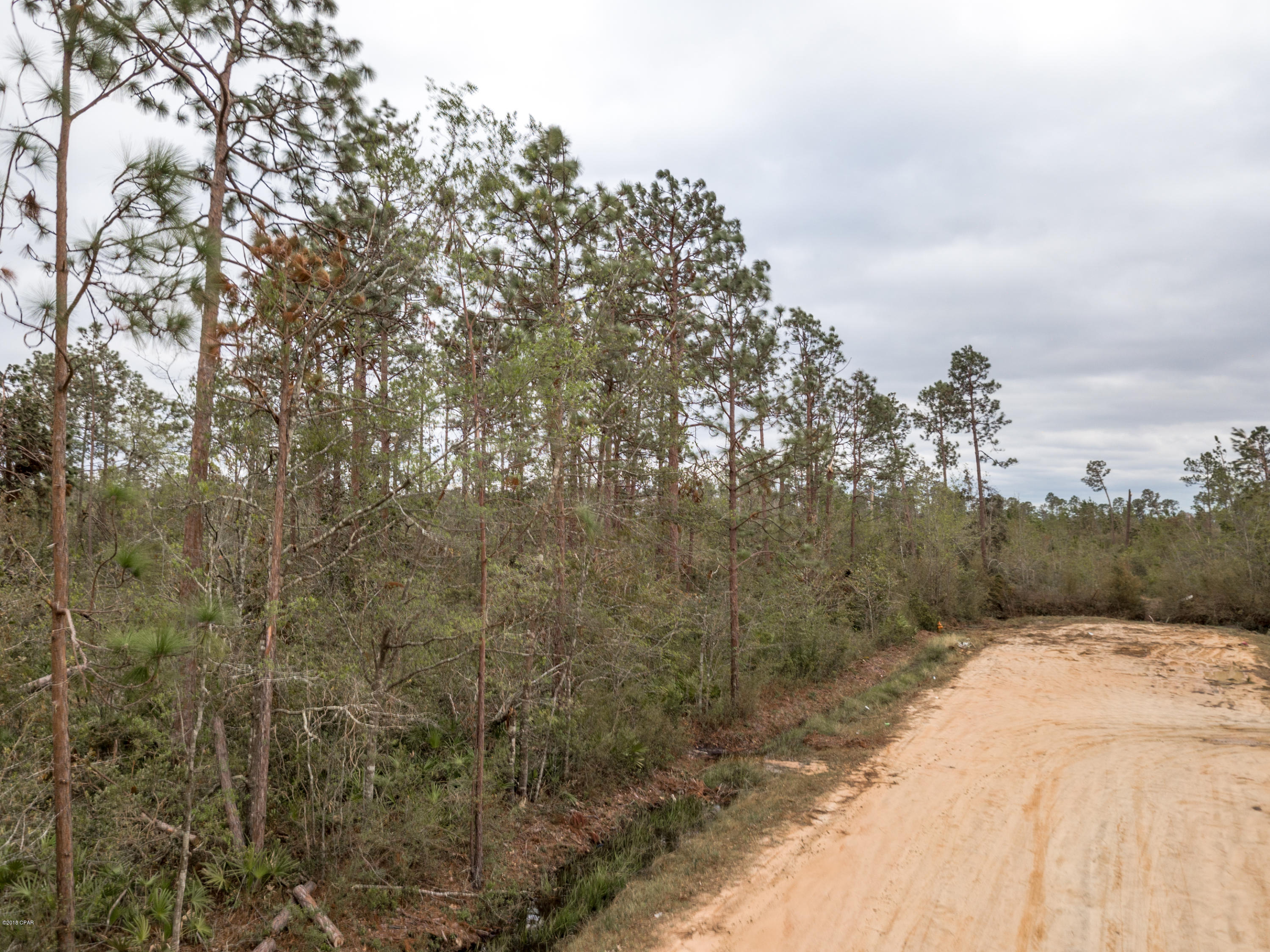 2 lots combined into 1. The other lots address is 	 7110 SPARROW RD and is located directly behind it. Located Close to the Bayou!!  All measurements are approximate and need to be verified by buyer. Zoned for single family home, mobile, and R-4. PICTURES COMING SOON!