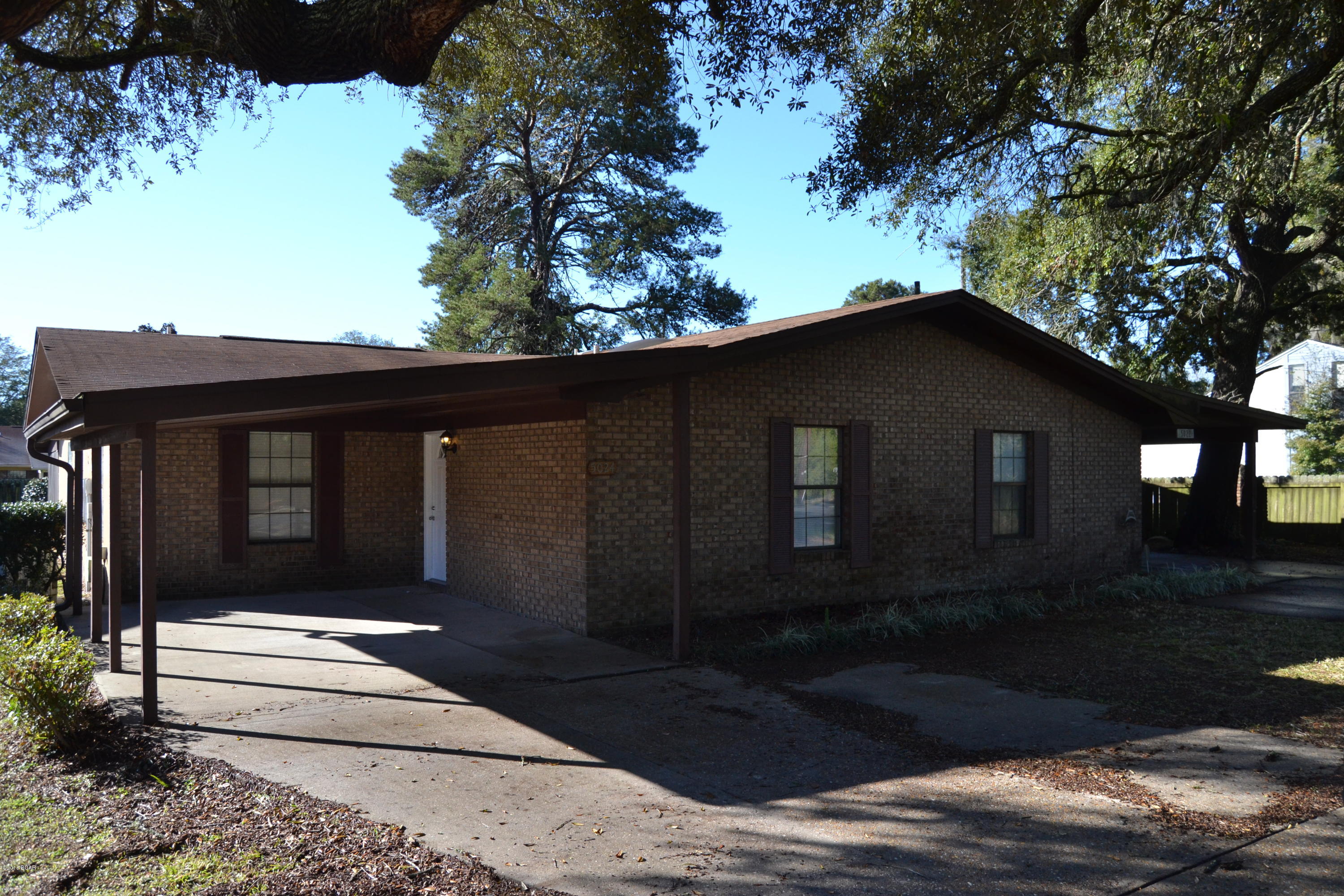 Freshly renovated 3 bedroom, 2 bath home located near Tyndall AFB, schools, shopping and restaurants.  The interior of this all brick home has new carpet and tile throughout, fresh paint, new counter tops, tile backsplash and stainless appliances.  The HVAC and water heater are newer also and the roof looks great, qualifying this home for ALL financing.  The exterior of the home features a huge screened in patio overlooking the privacy fenced back yard.  There is also a storage room in the screened in porch. A one car carport and driveway take care of off street parking.  This home is NOT a driveby, call today to see the inside and make sure to look at the pictures in MLS