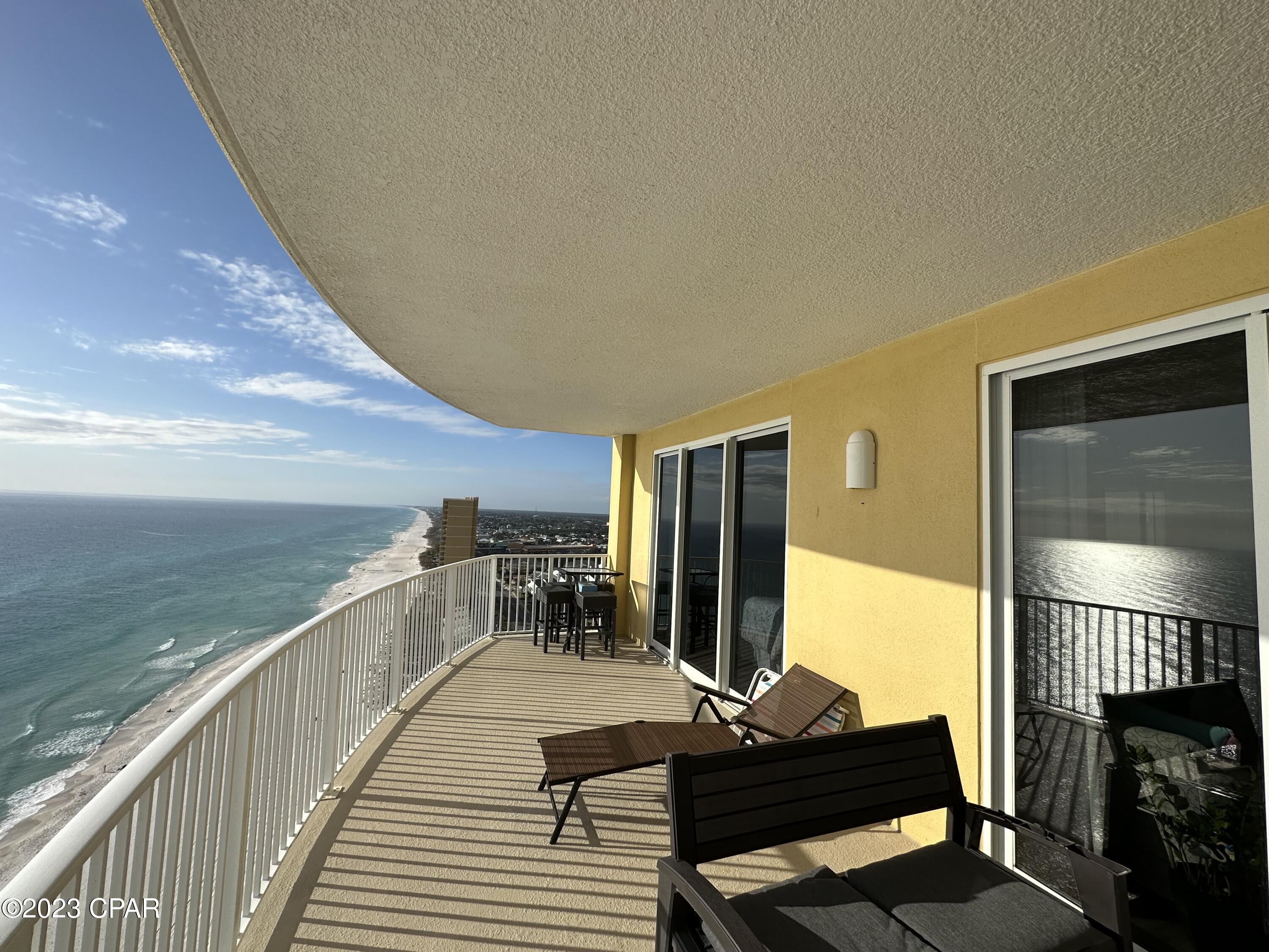 Luxurious condo located on the west end of Panama City Beach. This rare 2 bedroom and 2 bathroom end unit is spacious with over 1200 SF of space to enjoy. This unit is equipped with custom cabinetry with over and under lighting, back splash, wood floors throughout and high ceilings. Watch the world-famous sunsets from the wrap around balcony or walk down to the beach to lounge or take a swim.

 

Enjoy all of the amenities Emerald Isle has to offer like the indoor/outdoor pool, hot tub, beachside pavilions, and covered parking. Don't miss out on this one-of-a-kind opportunity!