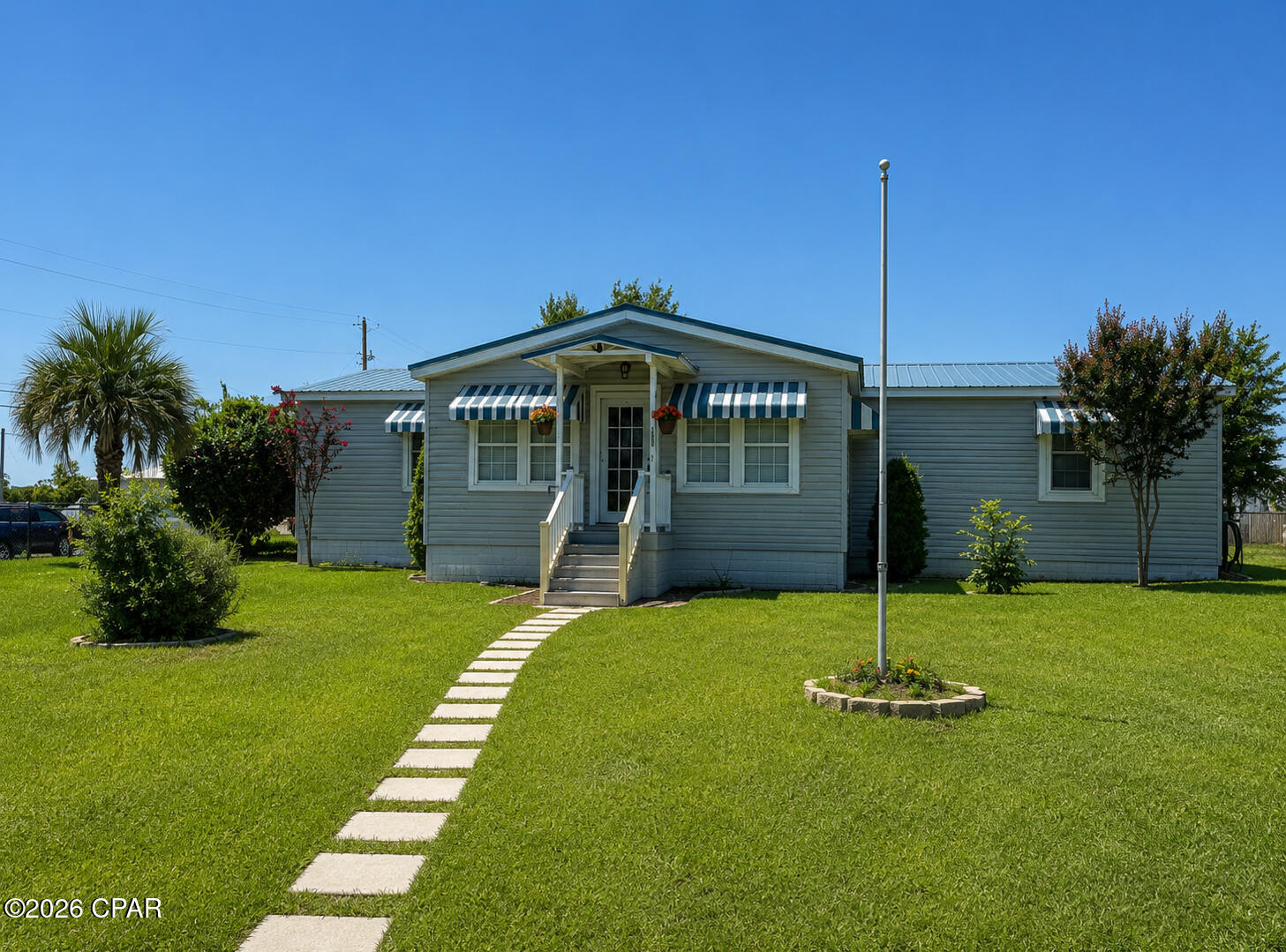 This cute home that has so many extras is for sale for new owners.  Split floor plan, gas fireplace, large kitchen, cathedral ceiling, large closets, covered porch and water view of Watson Bayou.  Full home generator, generac, well, and fenced in yard.  Two storage sheds and a gazebo with fire pit to watch sunsets and the water!  Watch fireworks from the city in your backyard.  Inside laundry area as well!
