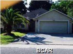 Great home in the South Lagoon area. Just a short walk to the beach, and very close to public boat launch to Grand Lagoon. This home is a 3 bedroom, 2 bath featuring breakfast area in kitchen, granite counter tops, appliances, vaulted ceilings in the living room, 2 car garage, and covered back patio with fenced back yard.