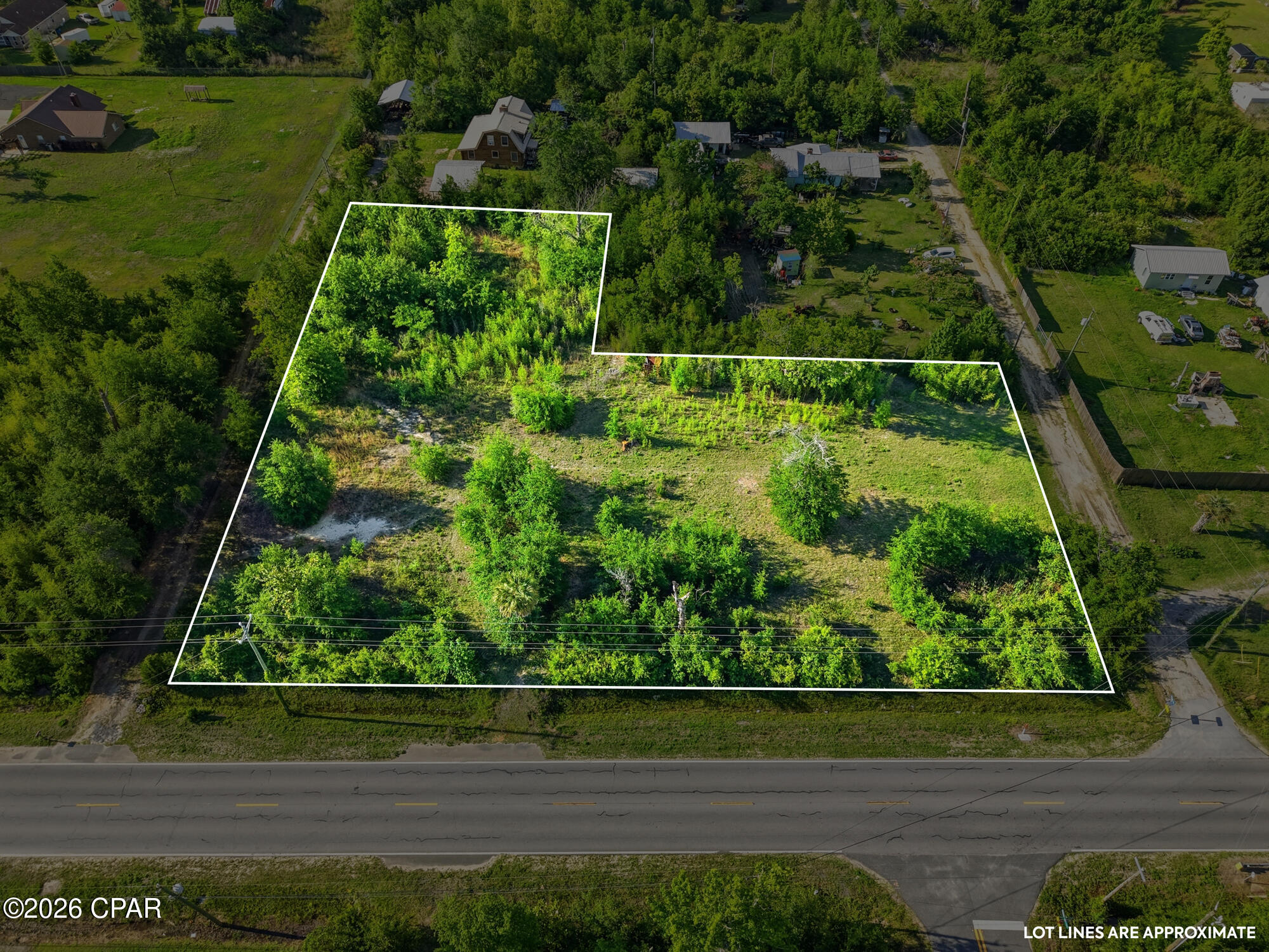 Pristine 1.499 acre lot that is loaded with potential. Build your new home and have plenty of room for gardening, live stock, and outdoor activities. You'll have that spacious country living feel but you are just minutes to everything! There is no HOA and the lot is high and dry.  There is beautiful trees, a pond and a blank slate to build your oasis. This beautiful lot can be accessed in multiple locations with 330 feet along John Pitts Road.  The location is just a few miles to Majette Park, HG Harders Recreation Complex and only 4 miles to the new Publix. There was a home on the lot prior to hurricane Micahel with power, well and septic tank but all will need to be assessed by the new buyer. Survey is available. Seller is motivated...make an offer today!