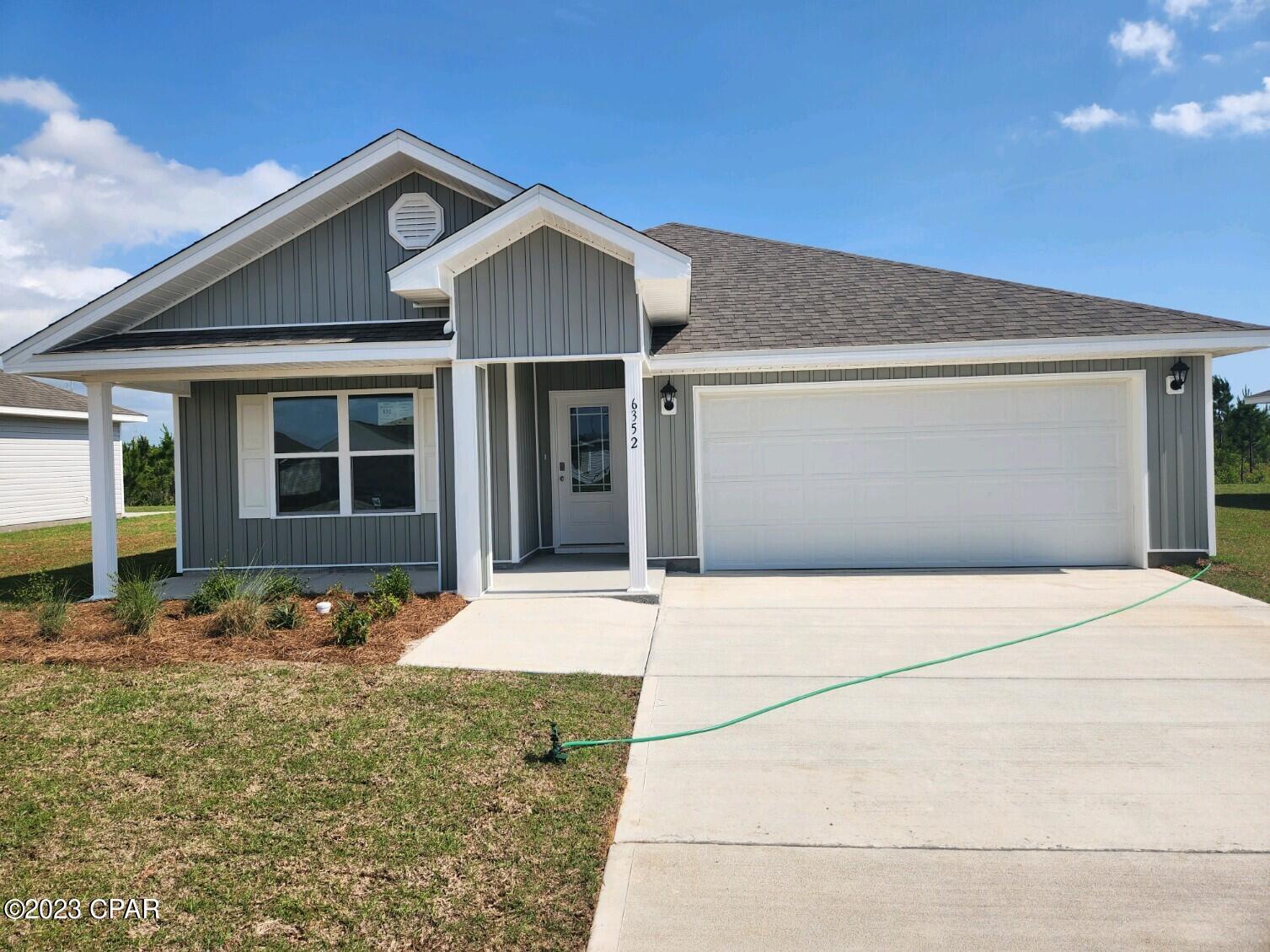 Liberty neighborhood is conveniently located in beautiful Panama City off of Star Avenue near 231. Located just 25 minutes from Tyndall Airforce Base, 20 minutes to hospitals, and less than 15 minutes to shopping, restaurants, and grocery stores you will be amazed at the convenience once you enter the winding entrance to this beautiful sanctuary. Liberty, D.R. Horton's premier new lifestyle community, offers a 7,500 square foot community center with full gym, wellness rooms and much more. Additionally, behind the community center is a water wonderland with resort style pool, splash pads, and an outdoor grilling kitchen with seating. Just when you thought it could not offer more, there are sidewalks, ponds, fountains, and conservation areas throughout this beautiful neighborhood full of nature.

When you enter the Cali floorplan through the prairie door you will notice immediately the brightness of the entry hallway. This 4 bedroom 2 bath, 1830 square foot, home is an open floorplan with two bedrooms separated by a full bathroom at the front of the home and one bedroom across the entry hallway affording family and friends alike privacy when visiting. The large kitchen island overlooks the dining room and living room allowing all to be together or doing individual tasks in each area. The main areas of the home as well as the bathrooms and laundry have beautiful luxury vinyl plank while the bedrooms offer plush carpeting. The spacious primary bedroom leads to the large bathroom featuring a soaker tub, large shower, water closet, and a massive closet. This home is situated on beautiful lot backing to the conservation area and a gorgeous pond. This 4-sided brick home comes with the front, sides, and backyard sodded.