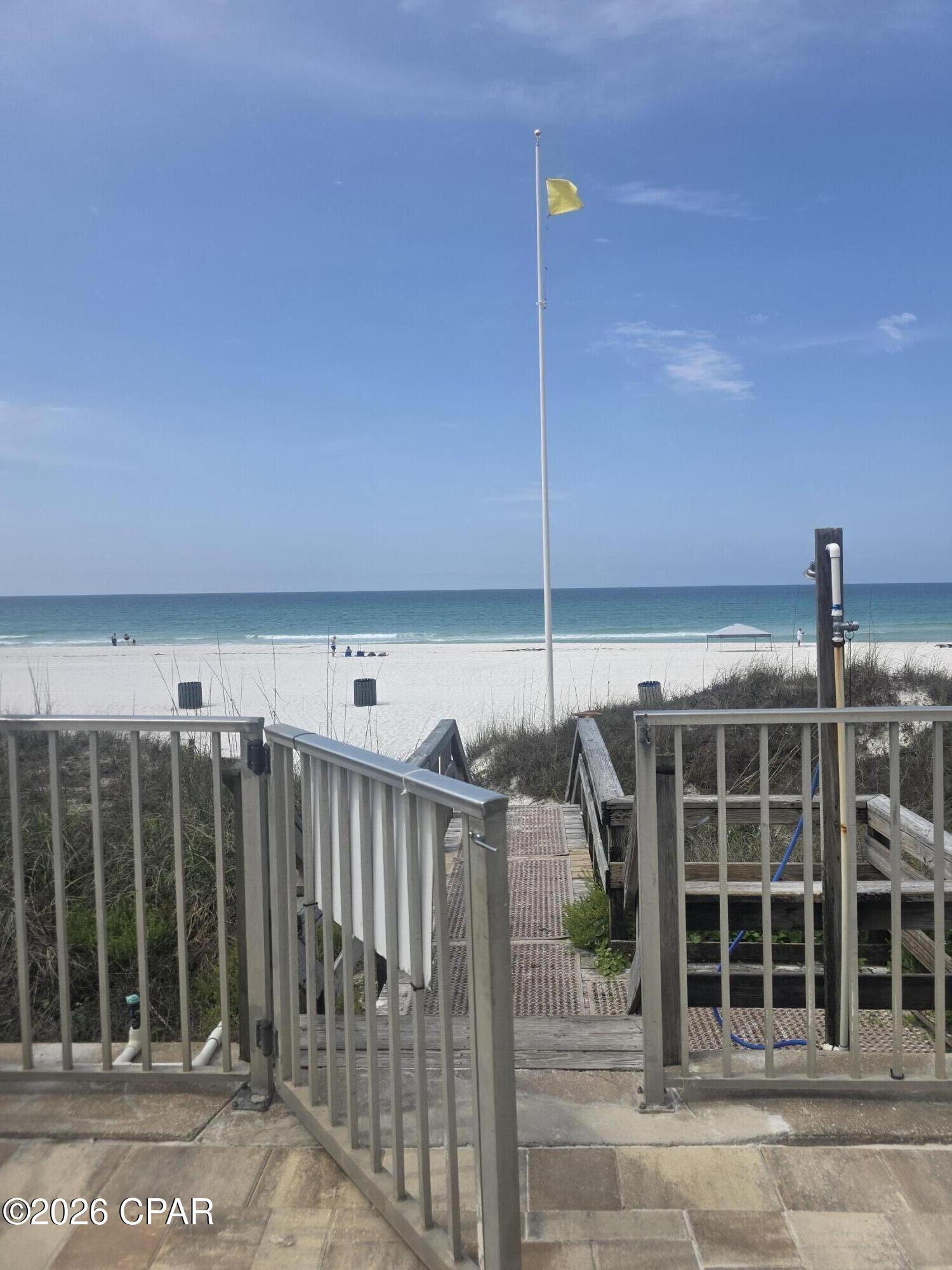 Located just steps from the Gulf, this clean and well-maintained efficiency/studio condo offers an easy coastal retreat in the heart of PCB East. The unit features a smart, functional layout with a Murphy bed to maximize living space and is being sold furnished and rental ready. Already part of the on-site rental program, this property offers flexibility for buyers looking for a private beach getaway or an income-producing investment. Enjoy Gulf-side pool access and a convenient location close to restaurants, shopping, entertainment, and all that Panama City Beach has to offer. Contact an agent today to schedule your private tour.