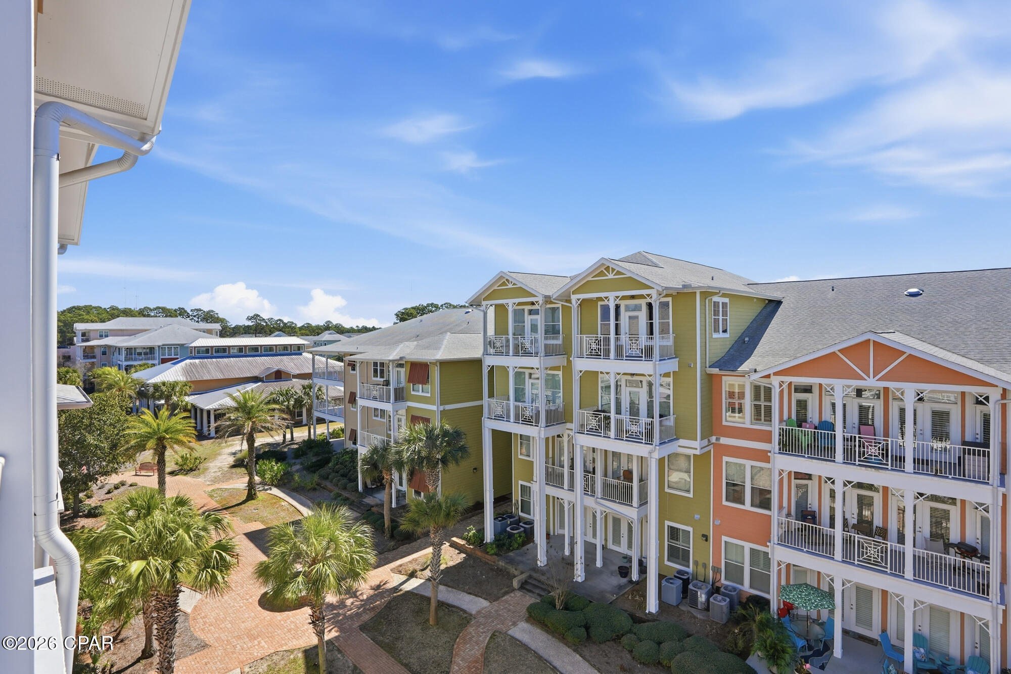 Don't miss out on your opportunity to live or invest in Island Reserve. Priced  to move , unit needs updating. Unique two-story, 1-bedroom, 1-bathroom condo that feels more like a sophisticated townhome than a traditional apartment. This residence offers an open floorplan and kitchen with granite counters, SS appliance and warm wood cabinetry. The dual-level layout provides exceptional privacy, highlighted by private balconies on both floors--perfect for enjoying sunrises and the coastal breeze. Residents of this premier gated community enjoy unparalleled resort-style amenities, including a massive one-acre pool with waterfalls, an outdoor hot tub, and a clubhouse boasting a 100-inch theater, fitness center, and indoor basketball and pickleball courts. Complete with the convenience of covered garage parking, a newer energy-efficient HVAC, and a pet-friendly atmosphere, this home offers a low-maintenance, upscale lifestyle just minutes from the white-sand beaches, shopping, and dining of Panama City Beach. **Note: No STR