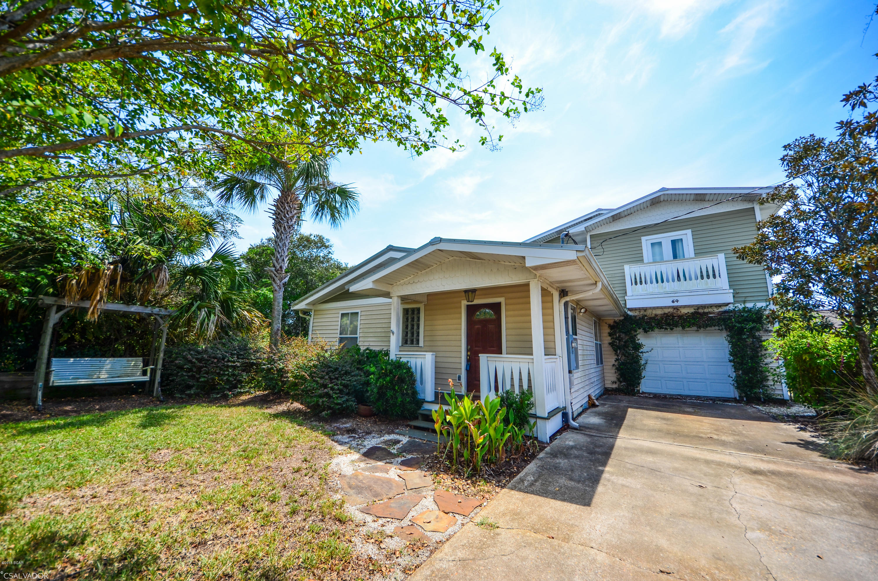 West End Charm. This Florida cottage is just a short five minute walk to the beach. 3 bedroom, 2 bath home was renovated in 2003. New gourmet kitchen with stainless steel appliances, laundry room, garage, original pine ceilings in living room, built-in book shelves in one of the bedrooms. French doors in the kitchen lead to the back deck. The second floor has a spacious master bedroom with a small porch. This is a great opportunity to own a spacious beach house for your family and/or rental property