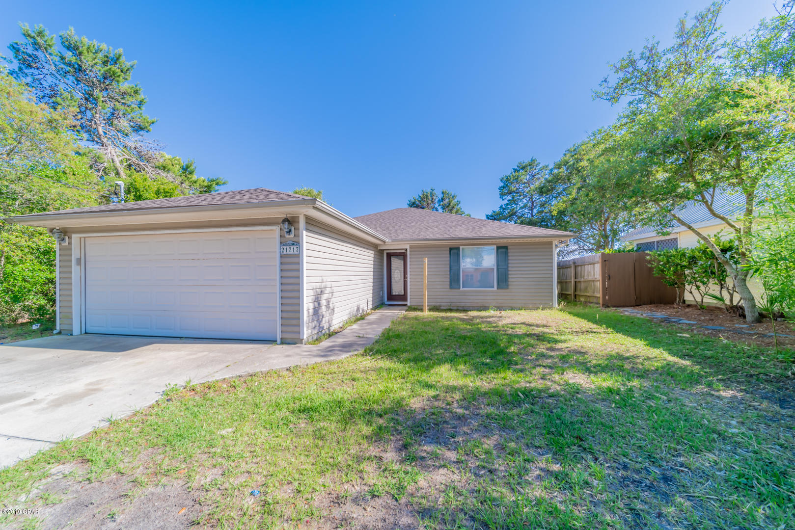 6 MONTH LEASE! TENANT MUST BE OK WITH PROPERTY SHOWING WITH 24 HOUR NOTICE!! DOGS CONSIDERED! This beautiful 3 bedroom, 2 bathroom home is located on the West end of Panama City Beach, south of Highway 98. It is available for rent, unfurnished, immediately. The property is currently for sale, so potential tenants must be OK with showings with a 24 hour notice for showings. The home is several blocks from the public beach access. The property features a 2 car garage, a covered patio and an open floor plan with vaulted ceilings. The backyard is completely fenced in, which is great for your privacy and pets. Enjoy the beach lifestyle in this golf-cart friendly community.