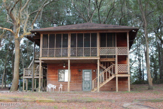 WATERFRONT on Beautiful Silver Lake. Two lots on Silver Lake with a nice two story home that includes a screened porch overlooking the lake, vaulted ceiling with a wood stove, new flooring upstairs. There is a separate cook shed, game room, bunk house area that has a half bath. Has a floating dock, outside grill, two swings by the grill and pit, too much to list. This lake does not allow gas engines on boats. You can have electric. Great Fishing, Swimming, and all around fu