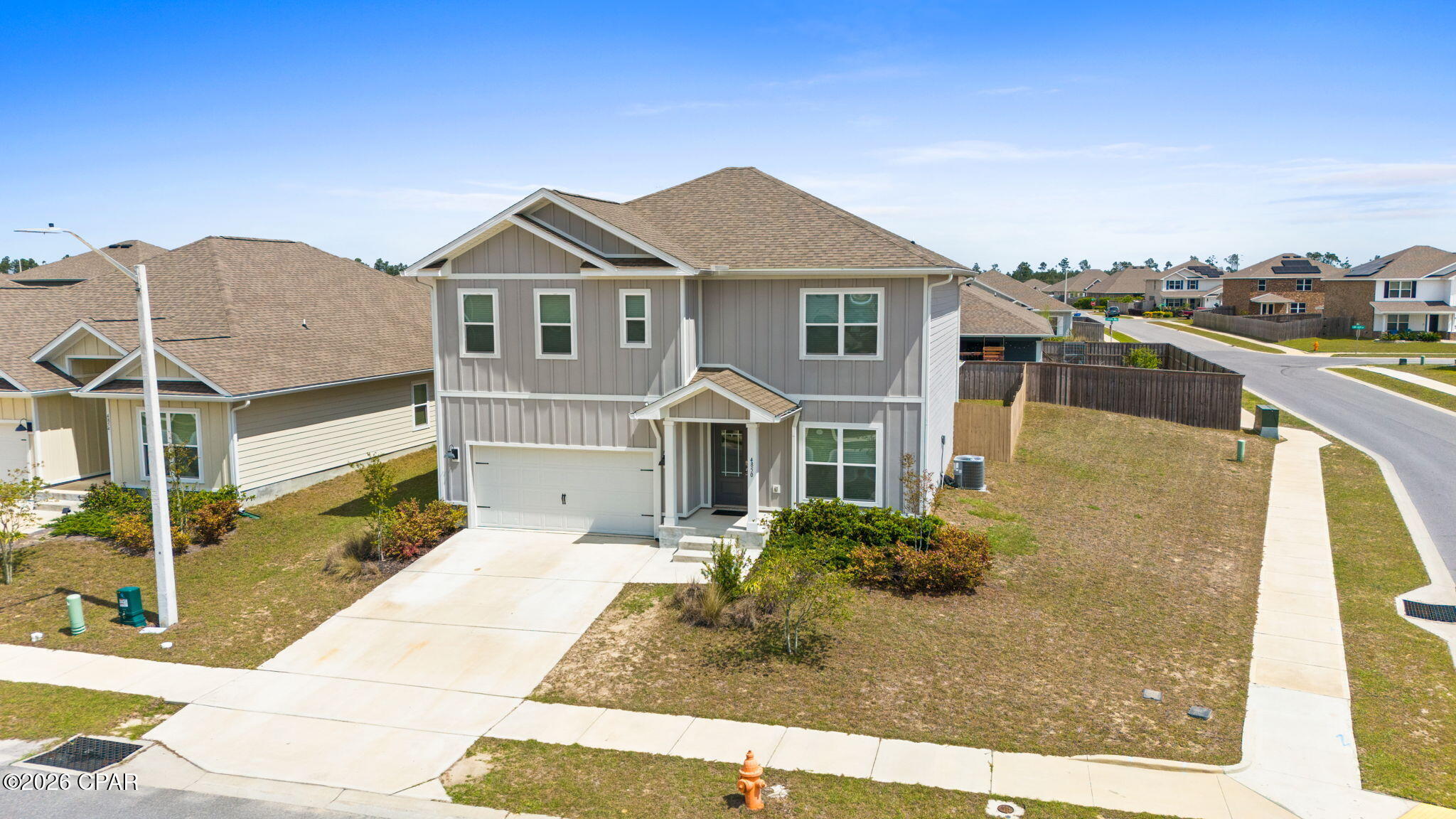 NEW PRICE + SELLER INCENTIVE! $5,000 price reduction AND $5,000 toward your closing costs or rate buy-down, now is the time to make your move! Some homes check the boxes -- this one feels right the moment you walk in.
Tucked in the sought-after Titus Park community, this two-story Carol floor plan was designed for the way families actually live -- with room to gather, room to retreat, and room to grow. Whether you're commuting toward Panama City, Lynn Haven, or Callaway, or heading approximately 25-30 minutes to both Tyndall AFB and Panama City Beach, the location puts you effortlessly in the middle of everything.
Step inside and the engineered vinyl plank floors set a warm, durable tone that says this home was built for real life. A flex room off the entry is ready to become whatever you need first -- a home office, a quiet dining room, a reading space. The heart of the home opens up from there: a generous living, dining, and kitchen area where granite countertops, white cabinetry, brushed nickel hardware, and stainless appliances give you a kitchen worth cooking in. Just off the dining area, step outside to a privacy-fenced backyard that backs to a common area, a rare stretch of breathing room where there's space for a garden, evenings on the patio, perfect for kids and pets alike.
A first-floor guest bedroom and full bath means visiting family or multi-generational living works without anyone sacrificing comfort. Upstairs, a second living area gives everyone a place to spread out -- movie nights, a playroom, a media space that keeps the main floor feeling calm. The primary suite is a proper retreat: double vanity, walk-in closet, garden tub, separate shower, and a private water closet.
The details are already done -- custom window blinds, a smart home system with keyless entry, and integrated controls. And the neighborhood delivers: the new Publix is minutes away, along with dining, shopping, and everyday services. North Bay Haven Charter Academy, a K-12, A-rated school, is nearby, along with Deer Point Lake, parks, and North Bay waters for boating and fishing. Community amenities include a pool, pavilions, dog park, and walkable design with sidewalks and bike lanes, making this a neighborhood you'll actually use and enjoy.
While new construction continues down the street, this home is ready now. No build timeline, no upgrade decisions, no waiting to find out if your finishes came in right. The hard part is done, all that's left is moving in and making it yours. Call your favorite Realtor® to schedule your showing today and come see why Titus Park keeps selling. Located in the highly sought-after Titus Park community, this two-story Carol floor plan offers a flexible layout and everyday convenience, conveniently positioned with similar access to Panama City, Lynn Haven, and Callaway, with approximately 20-25 minutes to Tyndall Air Force Base and 25-30 minutes to Panama City Beach. Designed with multiple living spaces, the layout provides both shared gathering areas and private retreats.
A welcoming entry leads into durable engineered vinyl plank flooring and a versatile front flex room, ideal for a home office, dining space, or additional sitting area. The layout opens into a spacious living, dining, and kitchen area designed for both everyday living and entertaining, with the kitchen featuring granite countertops, white cabinetry, brushed nickel hardware, and stainless Whirlpool appliances. Just off the dining area, access to the backyard reveals a privacy fenced yard backing to a common area, offering both usable outdoor space and a more open feel with added separation from neighboring homes.
The first floor includes a guest bedroom and full bath, providing a practical setup for visitors or multi-generational living. Upstairs, a second living area offers additional space for relaxing, media, or play, giving the home multiple living zones that allow everyone to spread out while staying connected. The primary suite features a double vanity, walk-in closet, garden tub, and separate shower with a private water closet.
Additional features include custom window blinds and a smart home system with keyless entry and integrated controls. Conveniently located just minutes from the new Publix Super Market at Titus Park, as well as shopping, dining, and everyday services, with close proximity to North Bay Haven Charter Academy, Deer Point Lake, and nearby access to North Bay waters for boating and fishing.
With new construction still active in the area, this home offers the advantage of a completed, move-in ready property without the wait, along with features already in place that buyers often add after closing.