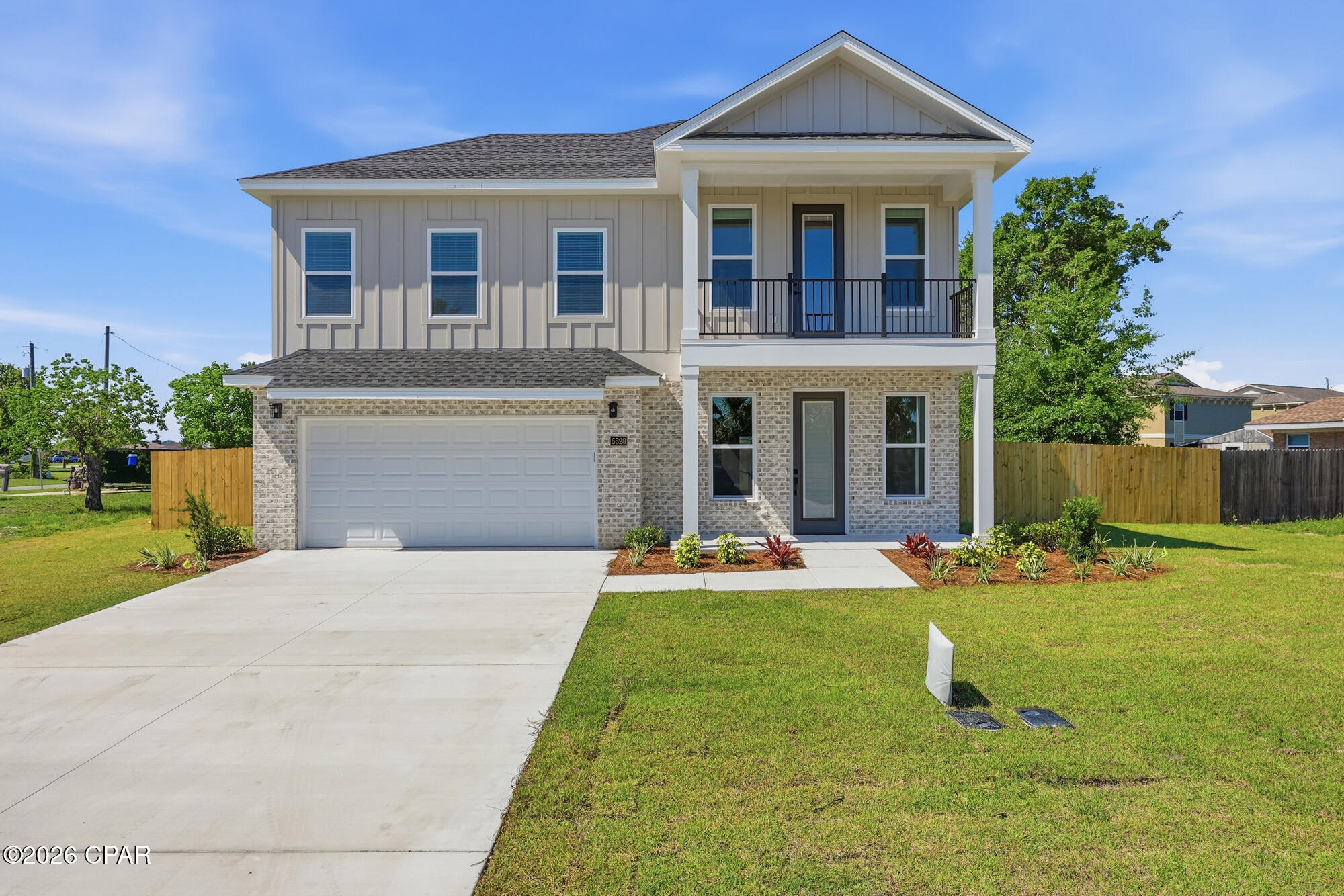 Enjoy COASTAL LUXURY in this light filled CRAFTSMAN style home located in an established neighborhood just minutes from Tyndall AFB. 
The classic architecture creates great curb appeal on an over sized corner lot. This light filled home features warm neutral LVP FLOORING, GORGEOUS QUARTZ COUNTER TOPS and SEPARATE DEN or MEDIA ROOM upstairs. The main living area includes an open floor plan with a large kitchen island and a dining space that opens to the covered back porch. 
On the second floor, a modern flexible floor plan offers loads of extra space. A primary suite has a charming balcony that's perfect for morning coffee or peaceful sunset views. The Den is the perfect spot for a workspace, playroom or media room. A convenient wet bar includes cabinetry, sink, and bar fridge. No need to go downstairs for snacks! 3 additional bedroom assure that everyone has plenty of space.
The exterior has a privacy fenced back yard and plenty of additional side yard for extra parking (cars, boats, RV, etc). Enjoy all this plus the lower insurance rates  for new construction . Best of all NO REQ FLOOD INSURANCE , and  NO HOA's !