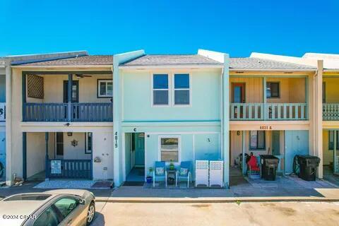 Welcome to the charming rental property at 4819 Hispaniola St C Unit A in Panama City Beach, FL 32408. This fully furnished gem boasts a cozy 1 bedroom and 1 bathroom layout, making it an ideal retreat for individuals or couples seeking a beachside haven. All utilities are included, property has shared laundry access for apartment A and B, and  new stove has been installed in the unit! Situated just one block away from a public beach access point, this residence provides easy and quick access to the sun, sand, and surf. Enjoy the serene coastal atmosphere from your private outdoor balcony, perfect for sipping morning coffee or unwinding after a day of beachside adventures. As a top-floor unit, relish in the added tranquility and picturesque views that this property has to offer, providing a delightful escape in the heart of Panama City Beach.
