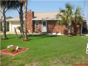 For rent. This cottage is located just 1 block from the beach and minutes east of Pier Park. It comes furnished, including 1 32'' Flat Screen in the master bedroom, 1 32'' Flat screen in the Florida room overlooking the back yard and a big screen in the Living room. Tenant pays all utilities. Please, no pets. Home is ready for immediate occupancy, call today for a showing appointment!