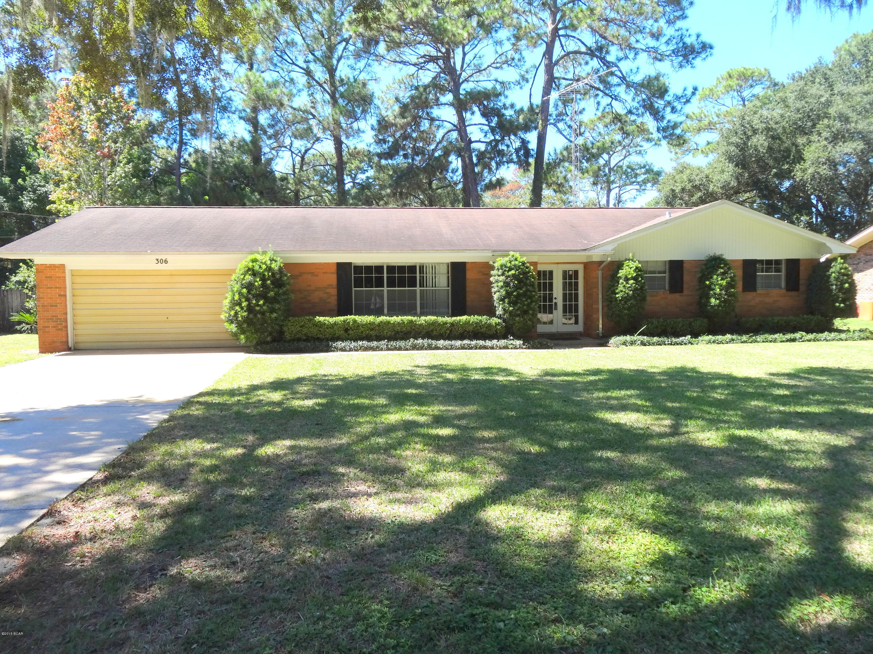 This wonderful home is located in a very nice area of Lynn Haven. Large family home with formal living and dining rooms, functional kitchen, family room with sliding glass doors to large backyard. Oversized 2 car garage with washer/dryer area. All brick exterior and beautiful yard with in-ground sprinkler system. This home will not last long. Call your Realtor today!. Age, Square Footage, room sizes approx, please verify.