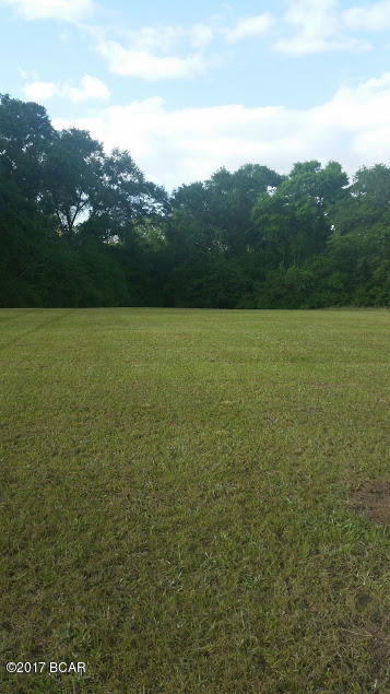 This is a beautiful Lot that backs up to a Babbling Brook the back lot line runs to the middle of the creek. It has public water and sewer.