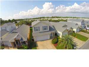 Well maintained subdivision, convenient to shopping and the world famous sugar sand beaches. Palm Cove is in the heart of the beach and only 1 1/2 miles to Pier Park. Convenient to fabulous restaurants and even the Trolly stops in front for a ride. Local schools are close by with bus service into the subdivision. HOA fee included, 2 swimming pools, pavilion, private streets with security after dark. Lawn maintenance is included and so is garbage pick up. Truly a great home. There are only 12 of this model out of 366 homes and is the largest home in Palm Cove. Features the only 2 car garage.
