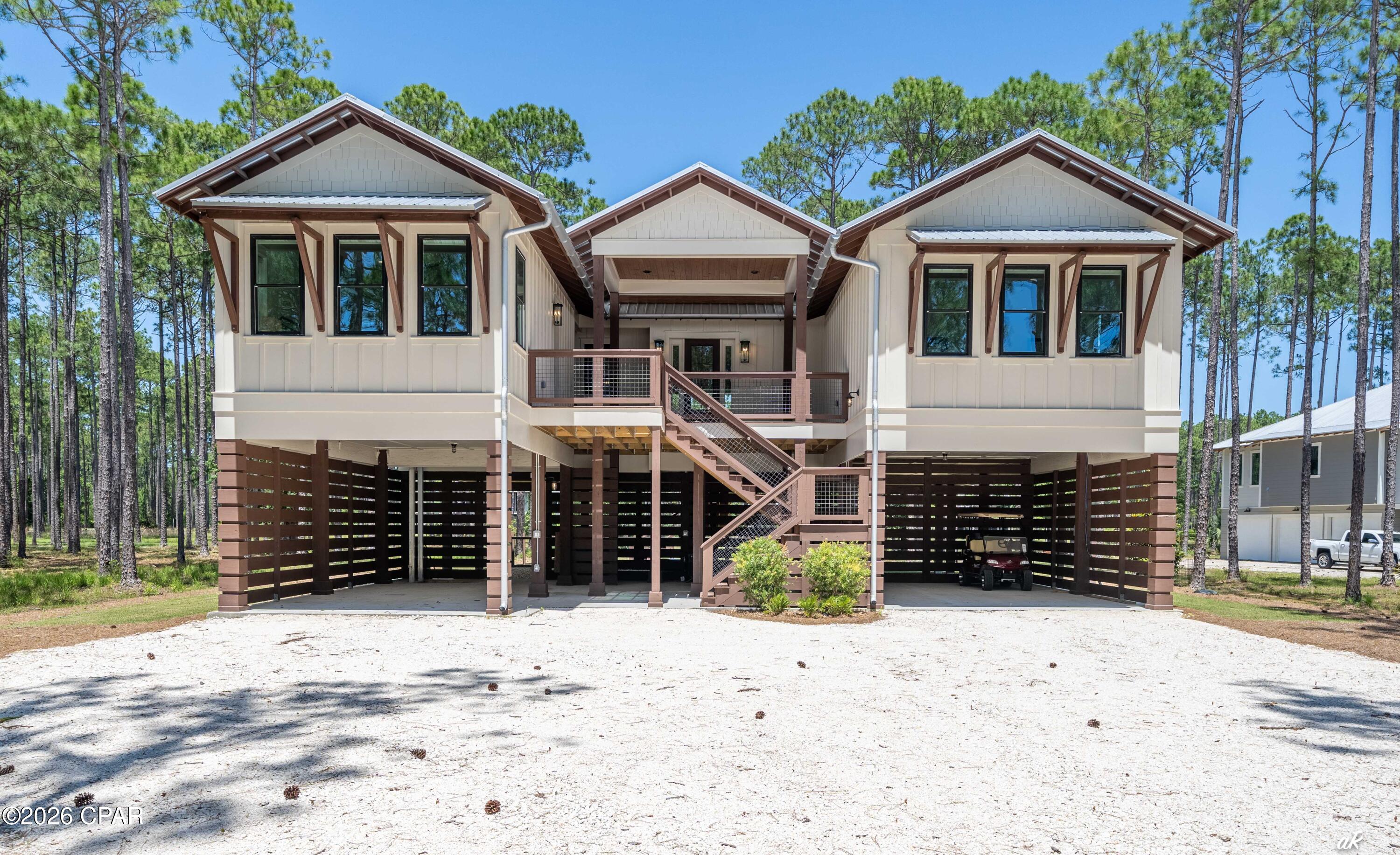 Rivercamps on Crooked Creek is a unique 1,500-acre gated community with HOA.
The amenities include a New Pool House & pavilion and New fitness center currently under construction. The Marina and docks are open to residence along with storage. Seven miles of trails for hiking, bikes and golf carts that connect neighborhoods and other amenities including waterfront playground the lighthouse prier and the campground,
This 2526 SF Home built in 2022 has been gently used as a second home and shows like a model. Three kings size bedrooms with ensuites bathrooms and walk in closets. Guest House separate from main house via covered front porch has a coffee bar and beverage cooler. Full House generator, two gas tankless water heaters, buried propone tank. Parking for two cars plus golf cart under the elevated house. Front stairs plus lift in front and back stair leading to the fenced back yard. Furniture negotiable with exception of art and library furnishings,