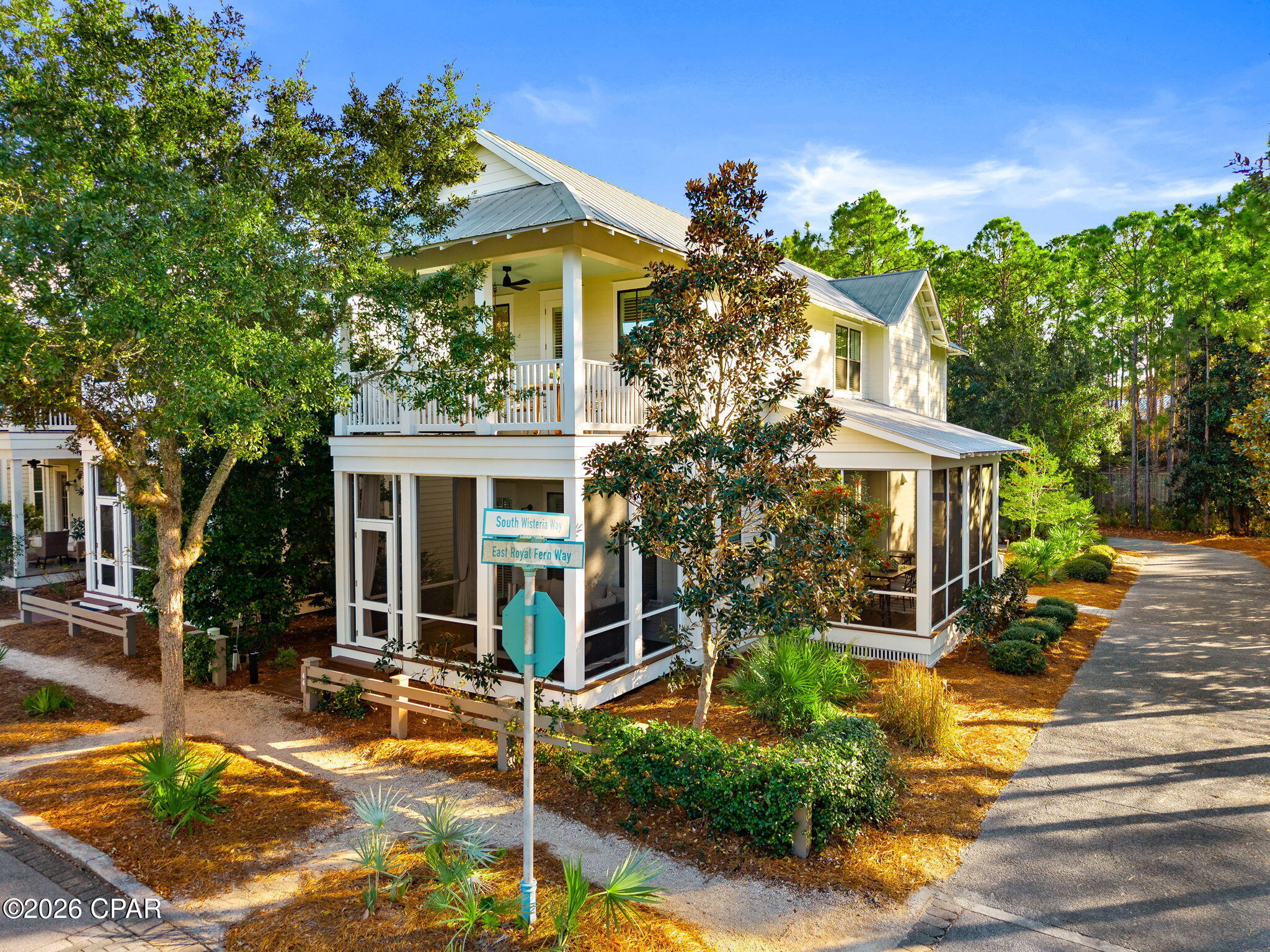 There is perfection and privacy with this stunning southern coastal home. This meticulously maintained beach retreat is surrounded by preserve on two sides and comes fully furnished, and the LSV Golf Cart stored in the attached garage which is great for exploring this golf cart friendly neighborhood. Watercolor has private beach access bordering Grayton Beach State Park, 9 community pools, tennis courts, pickleball, miles of nature trails, direct access to the 19-mile Timpoochee bike trail, beautiful parks, and green space. Numerous clubs and social events will keep the whole family entertained. Complimentary tram service is provided to the Town Center for boutique shopping and restaurants or spend the
day at the exclusive Watercolor Beach Club with zero-entry pool, a newly designed direct boardwalk access to the beautiful white beaches and gulf view restaurants.  Groundbreaking for the new fitness club and additional four pickleball courts is scheduled for January 2026 at the award-winning Watercolor Tennis Center. Watercolor Crossing, featuring Publix and a variety of stores and restaurants, is directly connected via golf cart path allowing quick and convenient access. The Boathouse by the bridge at Watercolor rents paddle boards and kayaks too.From the inviting front screened porch for relief on those hot summer days with new Ashley outdoor sectional for comfort and capacity to the side screened room for your dinner parties with family and friends, this home has it all. Once you walk through the front door, you will be greeted with a downstairs main level with a dry bar / additional prep area to keep the flow open , living room, dining room, kitchen, walk in pantry with mini refrigerator, ½ bath, a master bedroom with a king size bed, an ensuite bathroom with tiled shower double sinks and walk in closet with custom shelving. Shiplap walls add to the luxurious coastal feel.  Designer fixtures and crown molding are featured throughout the entire home. Hardwood floors add beauty and durability while hurricane protection plantation shutters allow abundant interior natural light throughout this gorgeous home. The dining area has an expandable round table and comfortable upholstered chairs for easy conversations. The family room has plenty of seating for everyone. 
The kitchen is a chef's dream with a gas stove, stainless appliances, white cabinetry, and tile backsplash and walk in pantry. There is lots of prep space with the quartz countertops and 3 bar stools great for breakfast or anyone wanting to help prep or converse with the chef.   The furniture and decor were hand-picked by home designers. All fabric downstairs has performance fabric which is perfect for weekly rentals or sticky hands. The upstairs has a bonus room great for reading, gaming, or flex space with daybed. The upstairs master has a king bed, ensuite bathroom with tile shower, and double sinks. The master closet has custom shelving. Off the master bedroom is a 16' x 10' deck with a daybed swing and with new table and chairs for that morning coffee or afternoon sunset.  The oversized guest bedroom has two twin bunkbeds, full size bed, desk, TV, walk-in closet with custom shelving, and an ensuite bathroom with tub shower combo and double sinks. This home sleeps 10 comfortably with beds for everyone. Outside you will find an enclosed hot and cold shower and a BBQ area with additional seating perfect for grilling conversations or watching the deer feed in the preserve. Two-car paved parking and garage behind the home provides ample parking and storage for all of your beach gear. The Dragonfly Pool is just a few doors down if you want to relax close to home. 
This is truly a well-maintained southern coastal home thoughtfully designed for entertaining or relaxing. Ask your realtor for the video tour of this beautiful home. Truly a turnkey home .