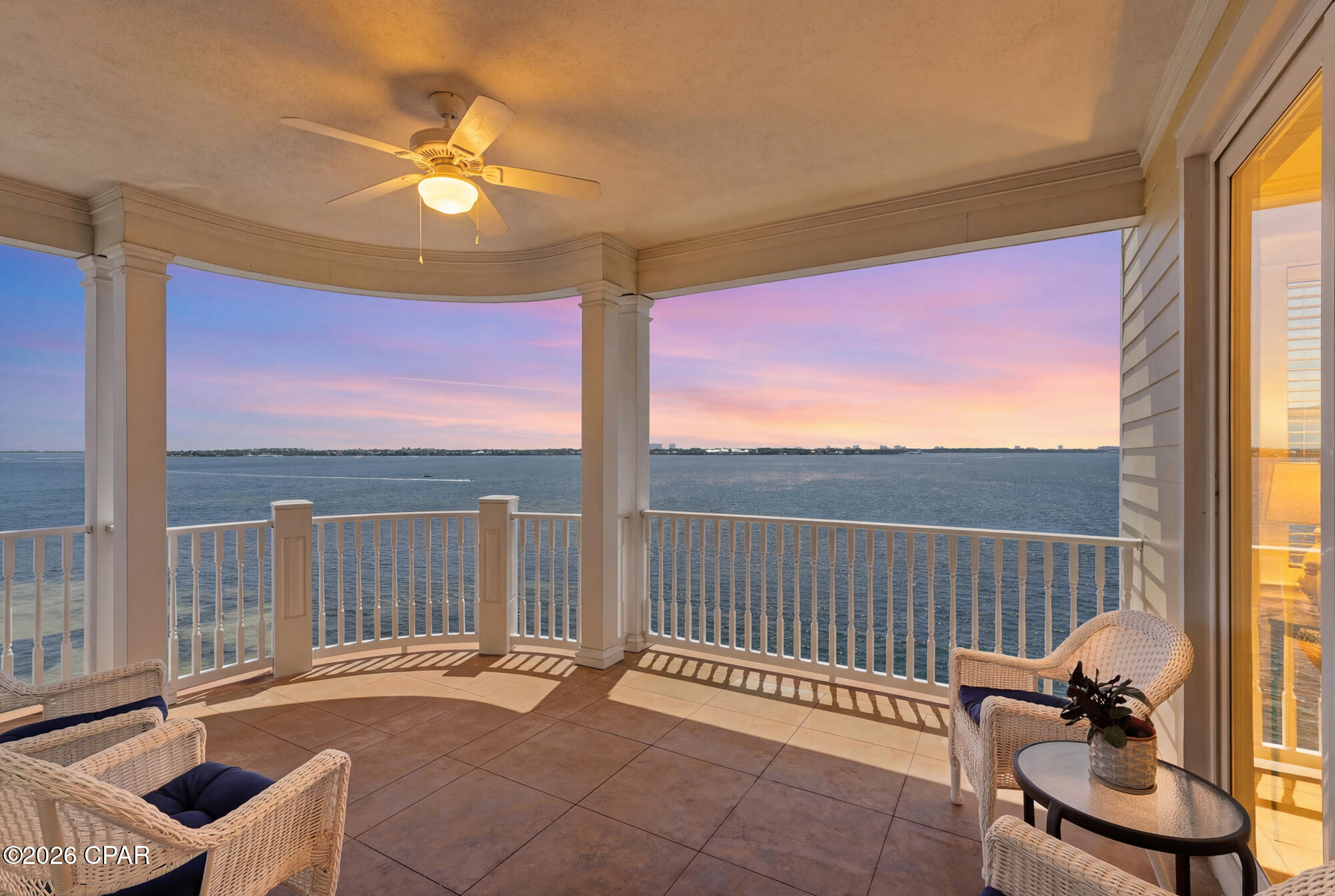Spectacular Waterfront Luxury in Historic St. Andrews! Rarely available and highly coveted, this expansive corner-unit residence at Harbour Village delivers over 2,300 sq. ft. of sophisticated interior living space, perfectly paired with a massive 300+ sq. ft. covered, wrap-around balcony showcasing breathtaking, unobstructed Western and Southerly views of St. Andrew Bay.Step inside to experience true ''Old Florida Charm'' blended seamlessly with modern elegance. The soaring 10-foot ceilings and refined crown molding create an airy, grand ambiance throughout the open-concept floor plan, where floor-to-ceiling glass ensures the sparkling bay views remain your permanent backdrop. The heart of the home is a fully updated chef's kitchen, meticulously redesigned with new custom cabinetry, elegant quartz countertops, seamless under-counter lighting, and a premium suite of stainless-steel appliances. Perfect for entertaining, the kitchen flows effortlessly into the spacious living and dining areas, all oriented to capture the daily boat parade and unforgettable Emerald Coast sunsets.Wake up to paradise in the private primary retreat, featuring two entire walls of windows that flood the room with natural light and frame dramatic, panoramic water views. This serene sanctuary offers direct, private access to the wrap-around balcony, a spacious  
en-suite bathroom with a large walk-in shower and double vanity, and a well-appointed walk-in closet complete with custom built-in shelving and loads of storage space. Harbour Village offers an unmatched luxury lifestyle with resort-style amenities. Enjoy the convenience of a secure parking garage with elevator access directly up to your floor. The resort grounds feature a gated private marina with boat slips, a heated bay-front pool and sun deck, a convenient gym, a welcoming community room, and a unique, beautifully landscaped 1-acre rooftop park featuring a grilling gazebo and outdoor fireplace. Nestled in a golf-cart-friendly district between Oaks by the Bay Park and the active St. Andrews Marina, you are just steps from the vibrant boutiques, live music, and fun dining along Beck Avenue. 24-hour gated security completes this waterfront paradise. Schedule your private viewing today!