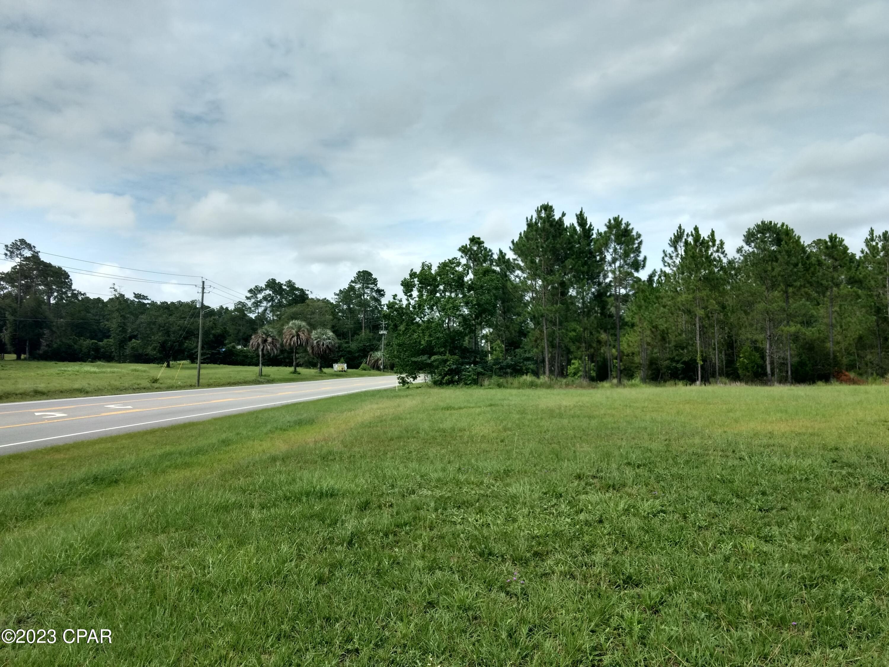 Great Commercial location with over 200' of frontage on HWY 79 South.  HWY 79 is the main route to Panama City Beach. Located right beside the Dollar General Market. And across the road from Cancun's Restaurant.