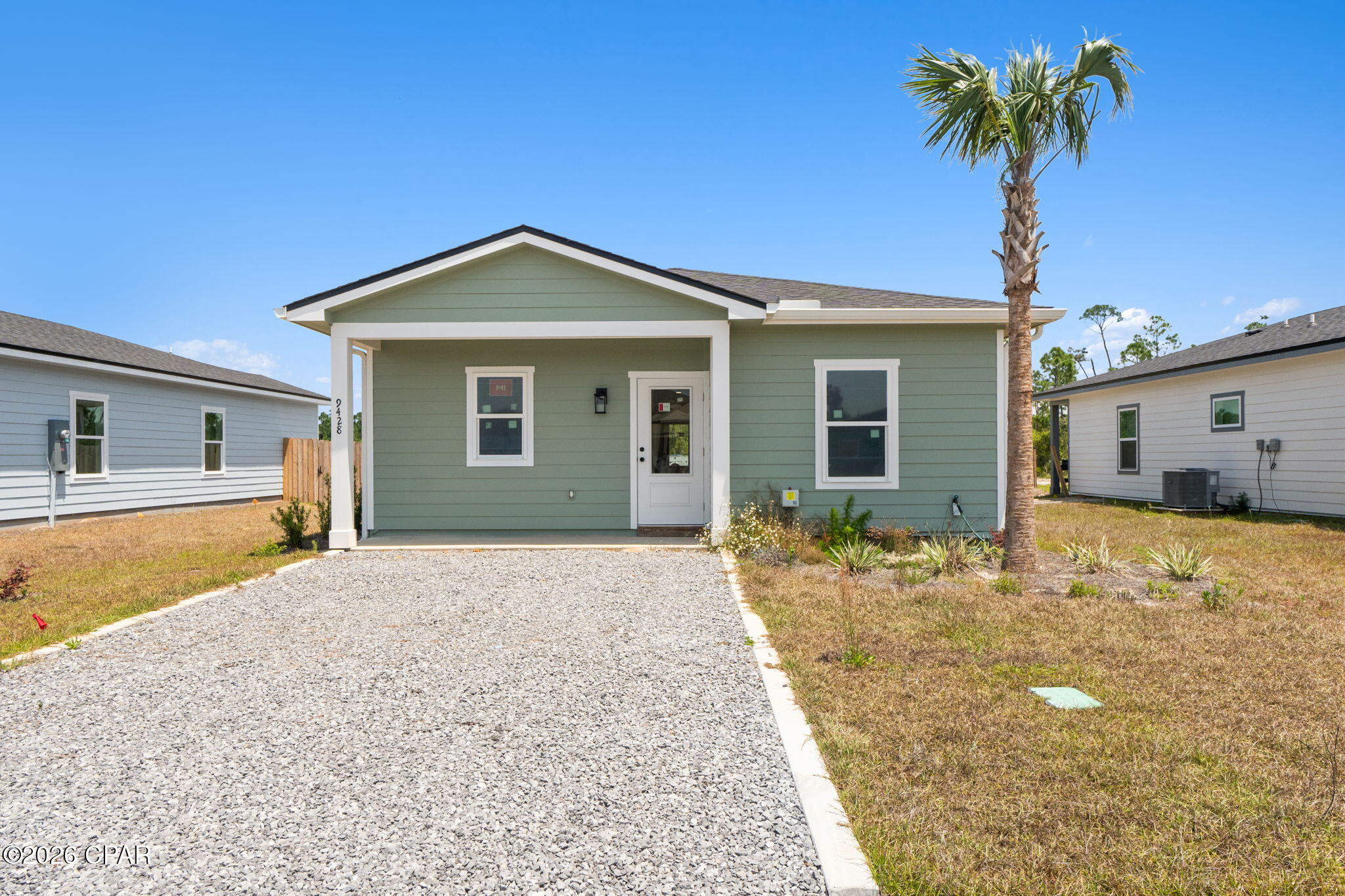 Easygoing coastal lifestyle meets modern comfort in this brand-new, move-in ready 3-bedroom, 2-bath home, perfectly tucked away on a quiet street just a short golf cart ride from beach access. Start your mornings with coffee on the patio, then head out for a full day of sun, sand, and salt air just minutes away. Step inside to a bright, open-concept layout designed for both everyday living and effortless entertaining. With 9-foot ceilings, abundant natural light, and a seamless flow from the living room to the kitchen, the space feels open and inviting. The kitchen stands out with quartz countertops, soft-close shaker cabinetry, stainless steel appliances, and an oversized island--perfect for gathering after a long day at the beach. The primary suite offers a peaceful retreat with a walk-in tile shower, dual vanities, and custom wood shelving in the closet, while two spacious guest bedrooms provide plenty of room for family and friends. Quality craftsmanship shines throughout with thoughtfully selected finishes that elevate the home beyond the expected. Step outside to a covered back porch and private fenced backyard, ideal for grilling, entertaining, or unwinding at the end of the day. Modern, energy-efficient features provide comfort and peace of mind. Living here means embracing the Forgotten Coast lifestyle--from beach days and boating to fresh seafood and laid-back evenings. Whether you're searching for a full-time residence, vacation getaway, or investment opportunity, this home delivers exceptional value. There's no time like the present to make dreams a reality. Come Live the Beach Life with us. Call today for more information.