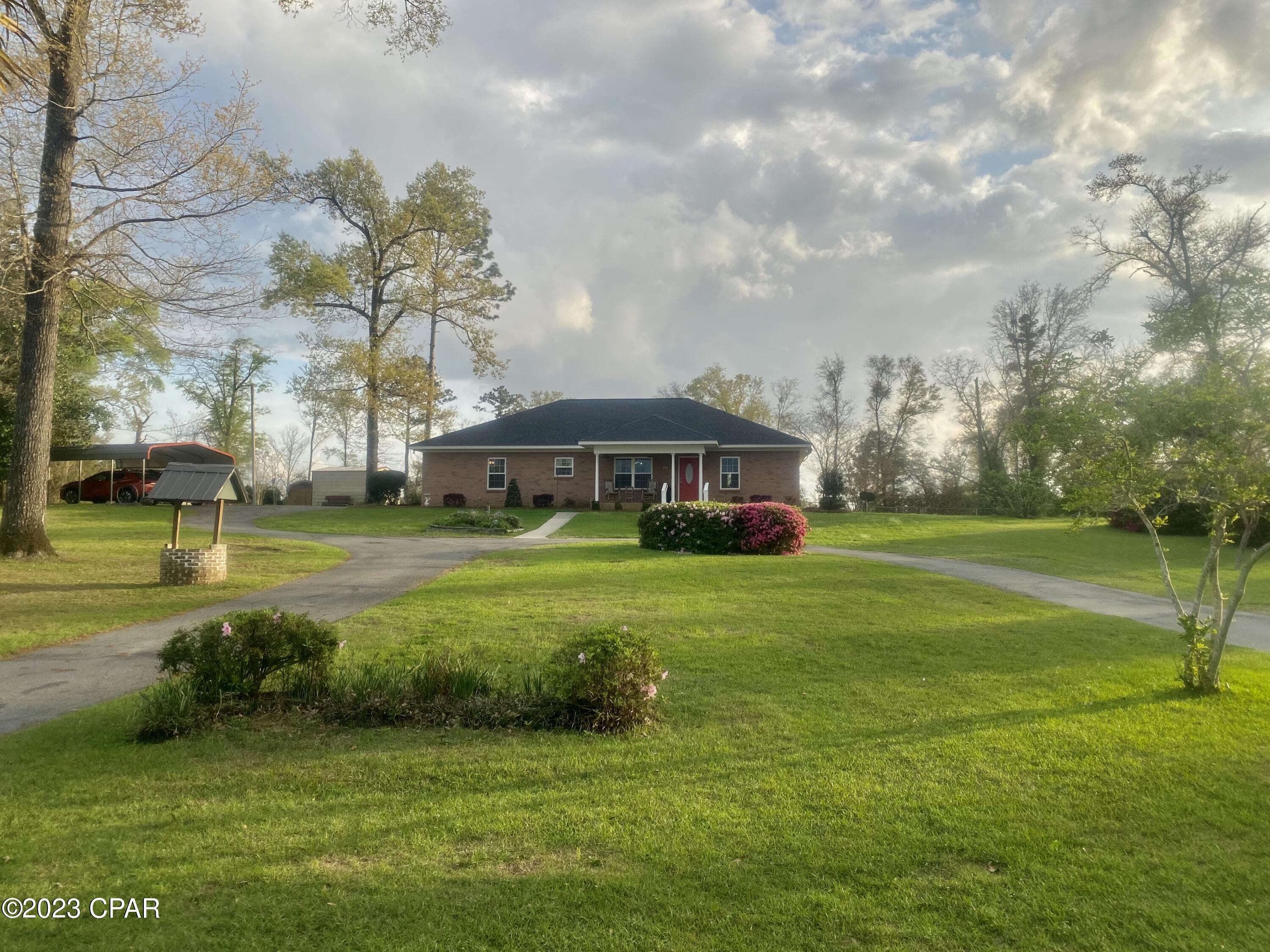 Have you been dreaming of a home sitting on a hill...  This is it!!  This beautiful 3 bedroom, 2 bath home was built in 2015 by David Dulaney!  From the moment you step in the front door, this place feels like home!  The kitchen is spacious with a breakfast area plus a formal dining room.  The master suite has a nice step in shower and a huge walk in closet.  Split bedroom floor plan.  Chain link fenced back yard.  Detached carport.  2 Storage buildings.  And this home sits on 2 lots!!  2.29 acres!