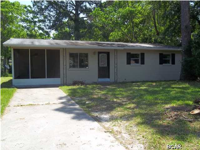COMPLETELY RENOVATED - NEW ROOF, NEW PAINT, NEW HVAC.... Charming concrete block home featuring newer kitchen cabinets & countertops, laminate flooring in the living and dining rooms. This home features 3 bedrooms, 1 bath, large screened in patio, laundry room, good amount of storage and a large yard, which is partially fenced. Great starter home or rental. (All sizes approximate and taken from public records, buyer to verify any details buyer deems important)
