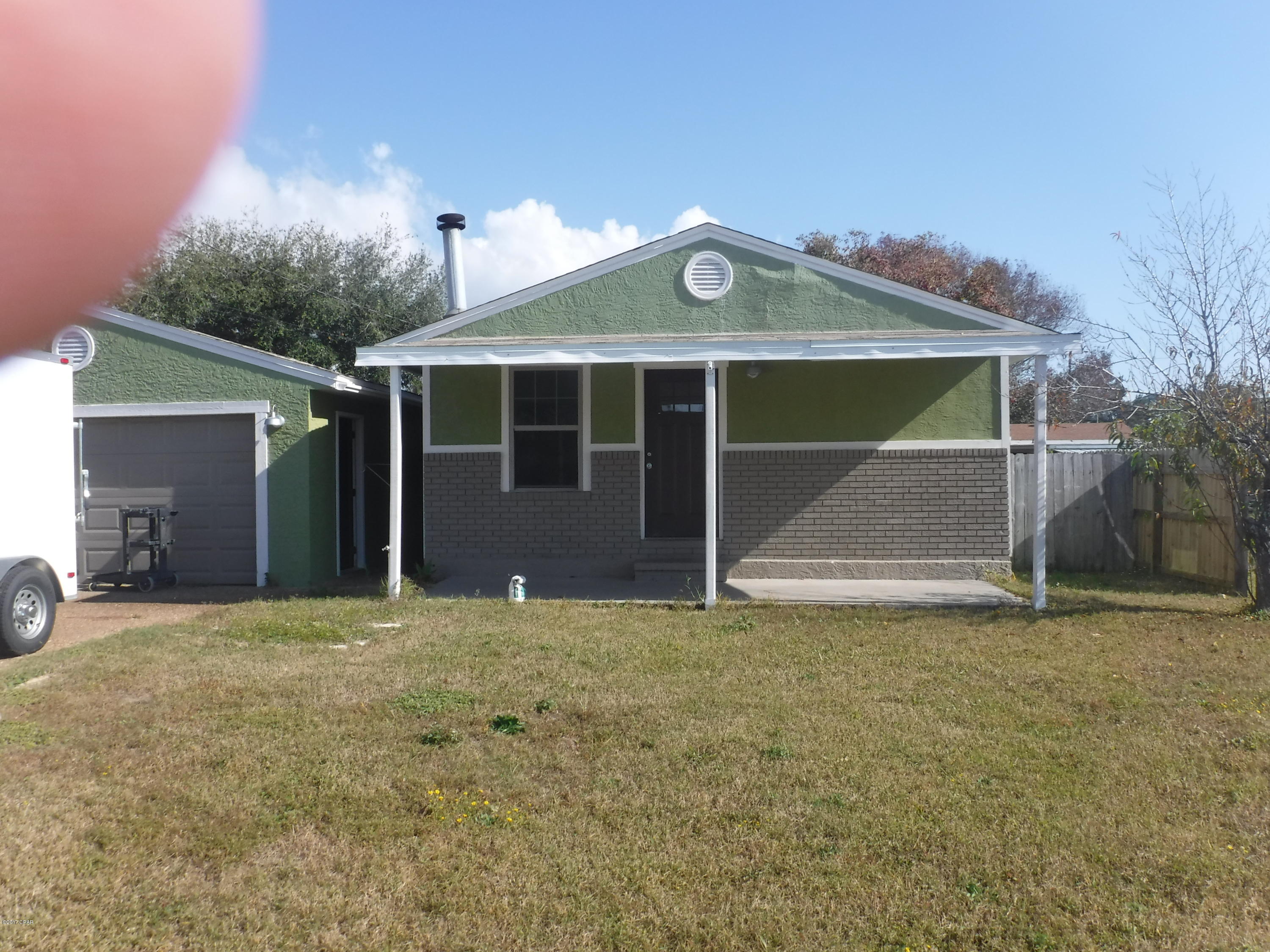 Beach house located in the Bid-a-wee neighborhood. This 3 bedroom 2 bath home has a new craftsman style kitchen with white cabinetry, beautiful granite counter tops and stainless steel appliances including a gas oven. There is recessed lighting, and a gas fire place for those cozy winter nights. The tank less water heater gives you endless hot water and the home includes washer/dryer hookups. The over-sized detached garage is perfect for your projects. You will love the wide plank, hand scraped hard wood floors, all new craftsman style windows, tile floors in the bathrooms as well as in the master shower. Tenant will be responsible for all utilities and yard maintenance. (NO SMOKING) Will consider small pets only with non refundable pet deposit. Please call Bill for showing 850-630-8466