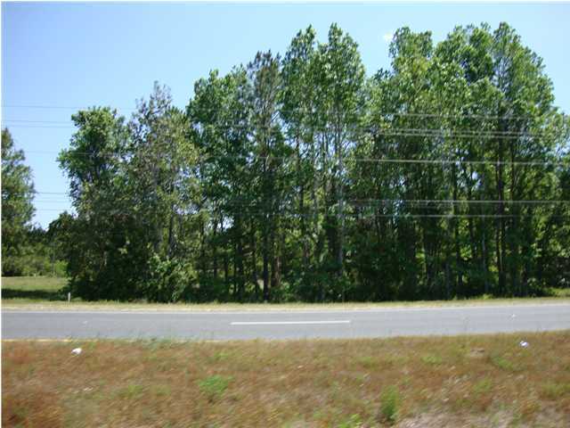 Beautiful  12 Acres with a stream.  Approximately 1000 feet on Hwy 77  with road frontage on Annie Lee Brock.   Zoning can be changed to commercial. Ideal for storage units or RV storage, rentals multiple opportunities..  Do not drive on the property without being accompanied by  a real estate agent. No value given to the mobile home on property.  Mobile home is occupied. Do not disturb. Call for appointment to view the property.