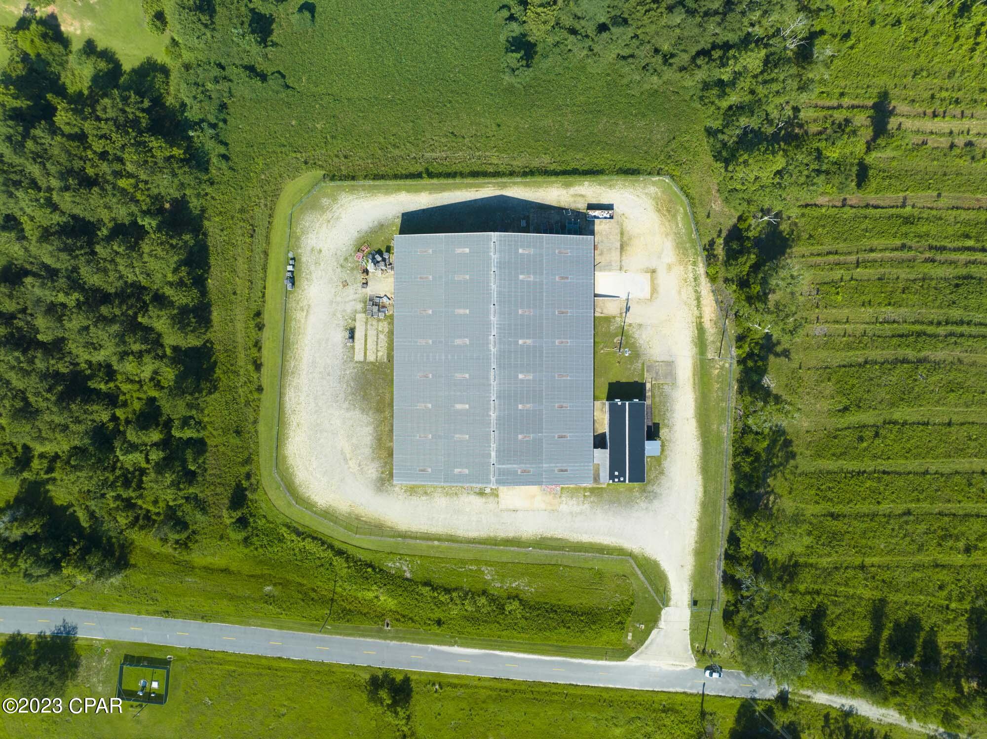 Warehouse for sale - Located in Washington County on 12.92 acres of land with 2 buildings, a 32,000 SF warehouse building and a 1,983 SF office space is net leased to WestPointe Home, a division of Ichan Industries. 

The Story:
The below market rate lease term runs for approx. Lease ends in July 2026 great for owner occupied. 

The warehouse has a 25-foot ceiling heights, 2 ground-level roll up doors, 1 loading door with 4' truck well, concrete load-stressed floors, metal roofing, and full fire suppression.

The property also has 220/240V, 3 phase power and City water/sewer, in an prime area for growth. Approx 7 Acres dry and high vacant land to construct on. 

Strategically located within the Chipley Industrial Park, within 3 miles to Interstate 10, this building provides an optimal position to service.

Quick Access to Tallahassee, Pensacola, Montgomery, and Panama City MSA's. Constructed in 2007, the Chipley Warehouse includes a 1,983 SF office building built in 2005 and is in good condition. 

CAP rate on current NOI is 6.01%.